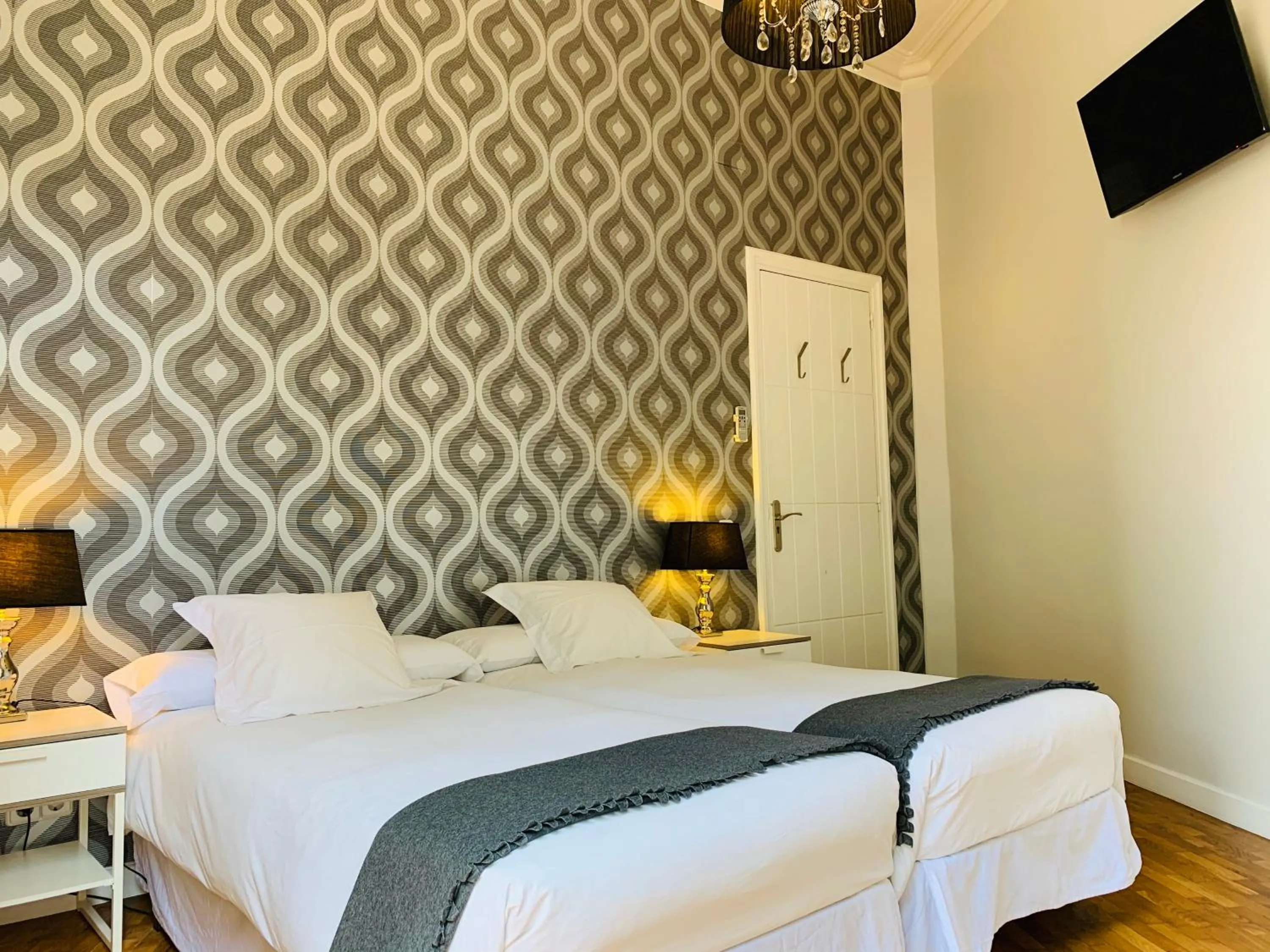 Bed in Super Balmes Guest House