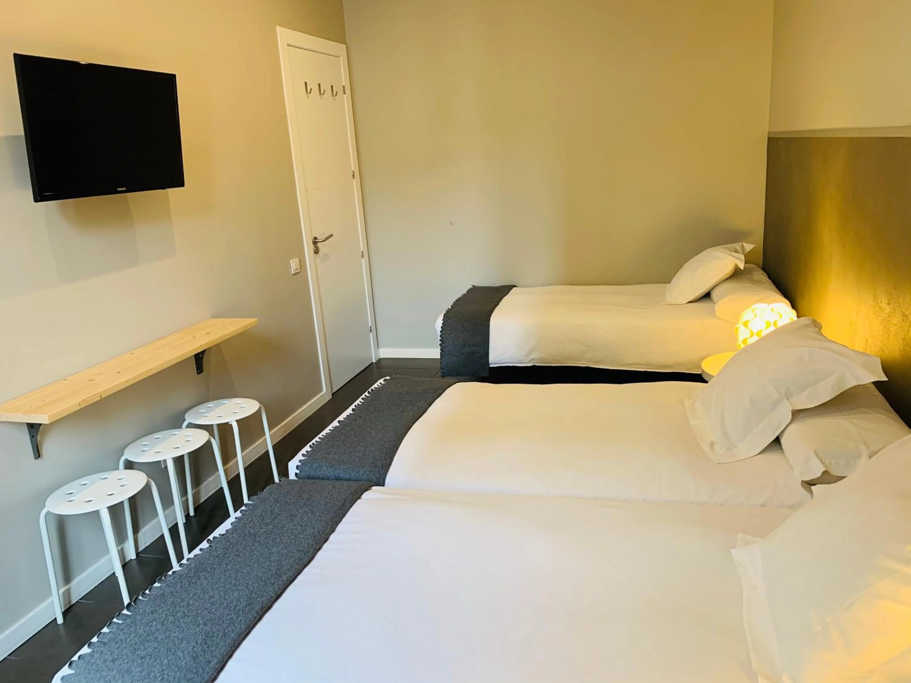 Bed in Super Balmes Guest House