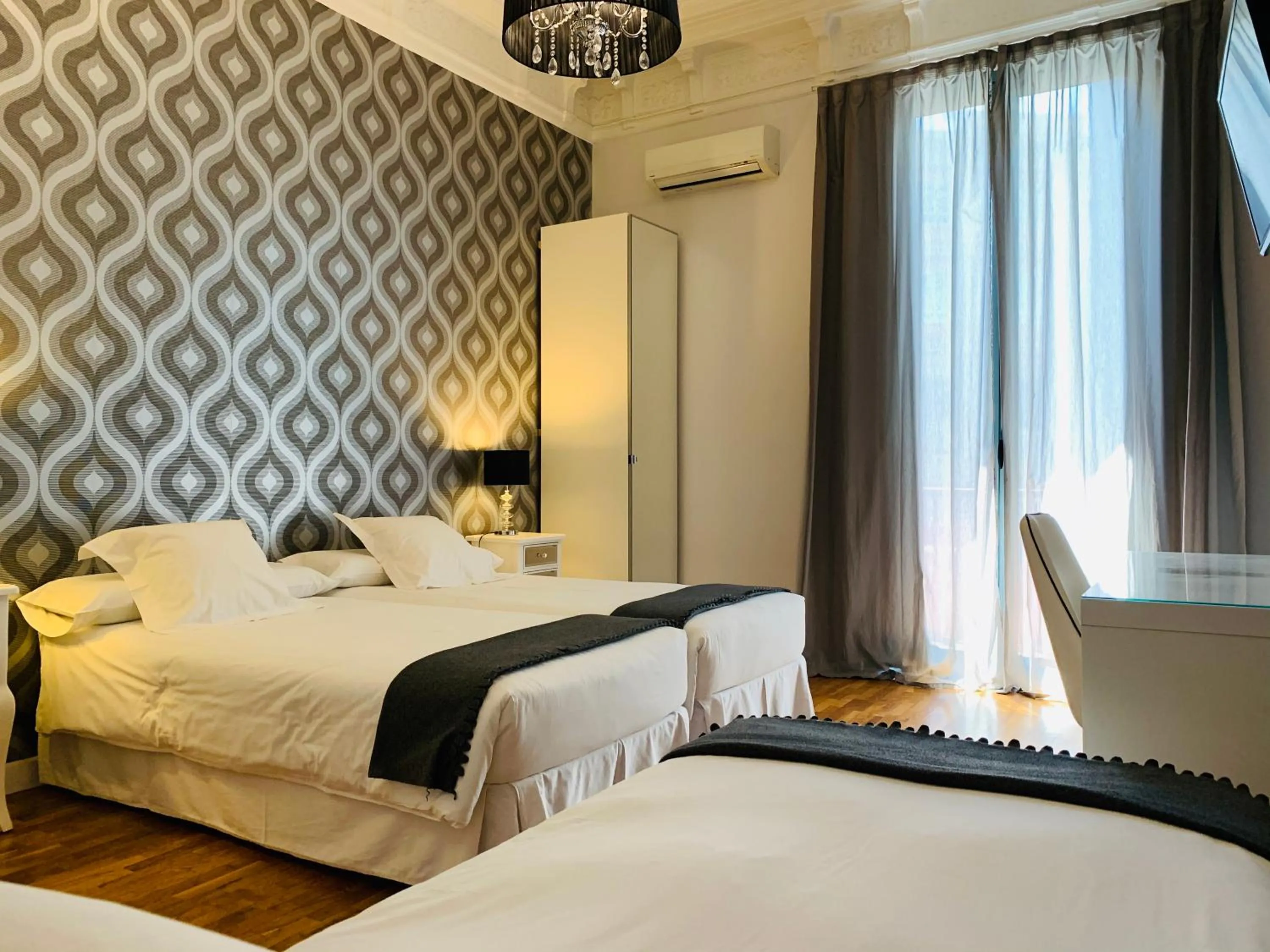 Bed in Super Balmes Guest House