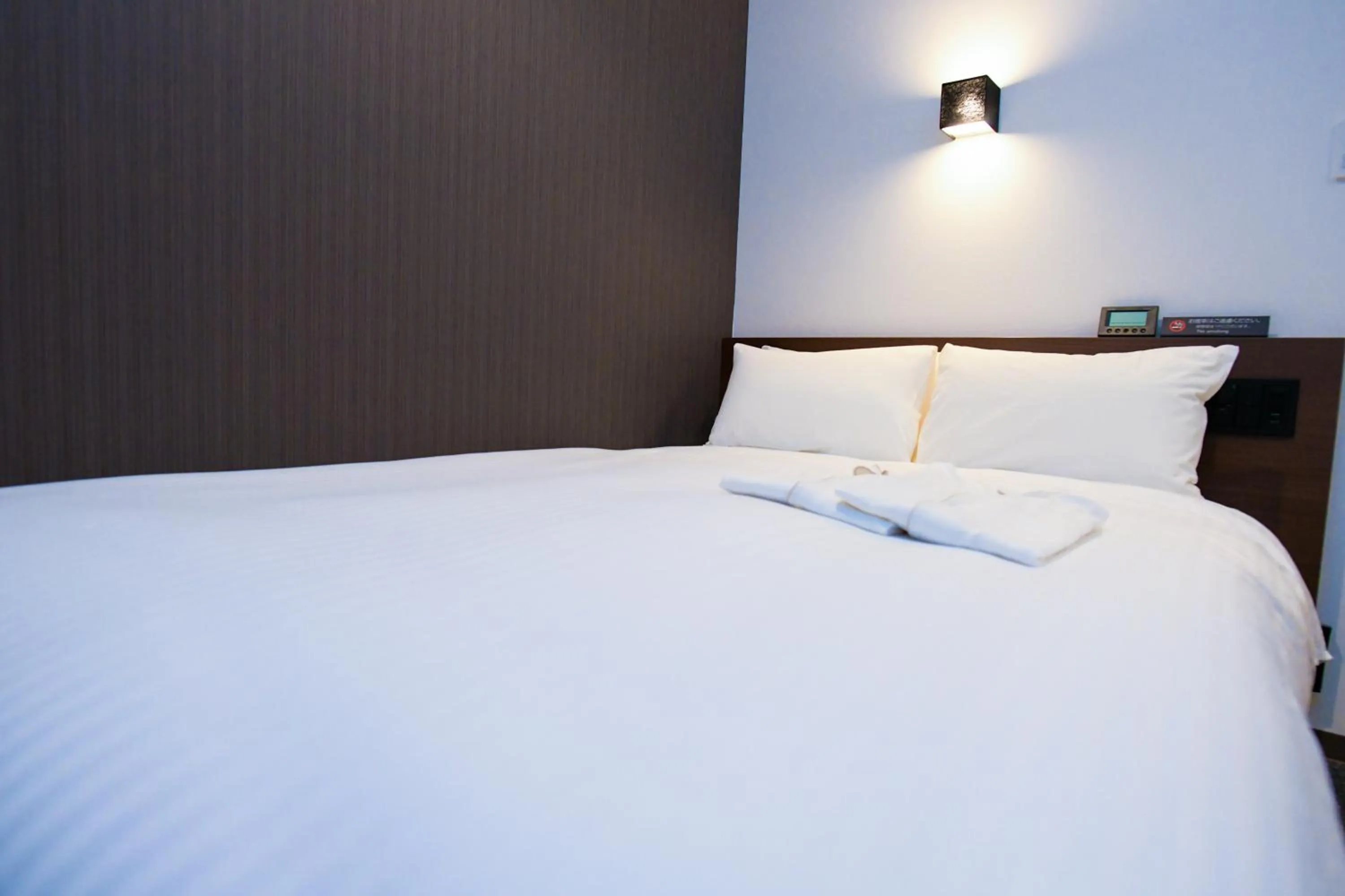 Bed in YOU STYLE HOTEL HAKATA