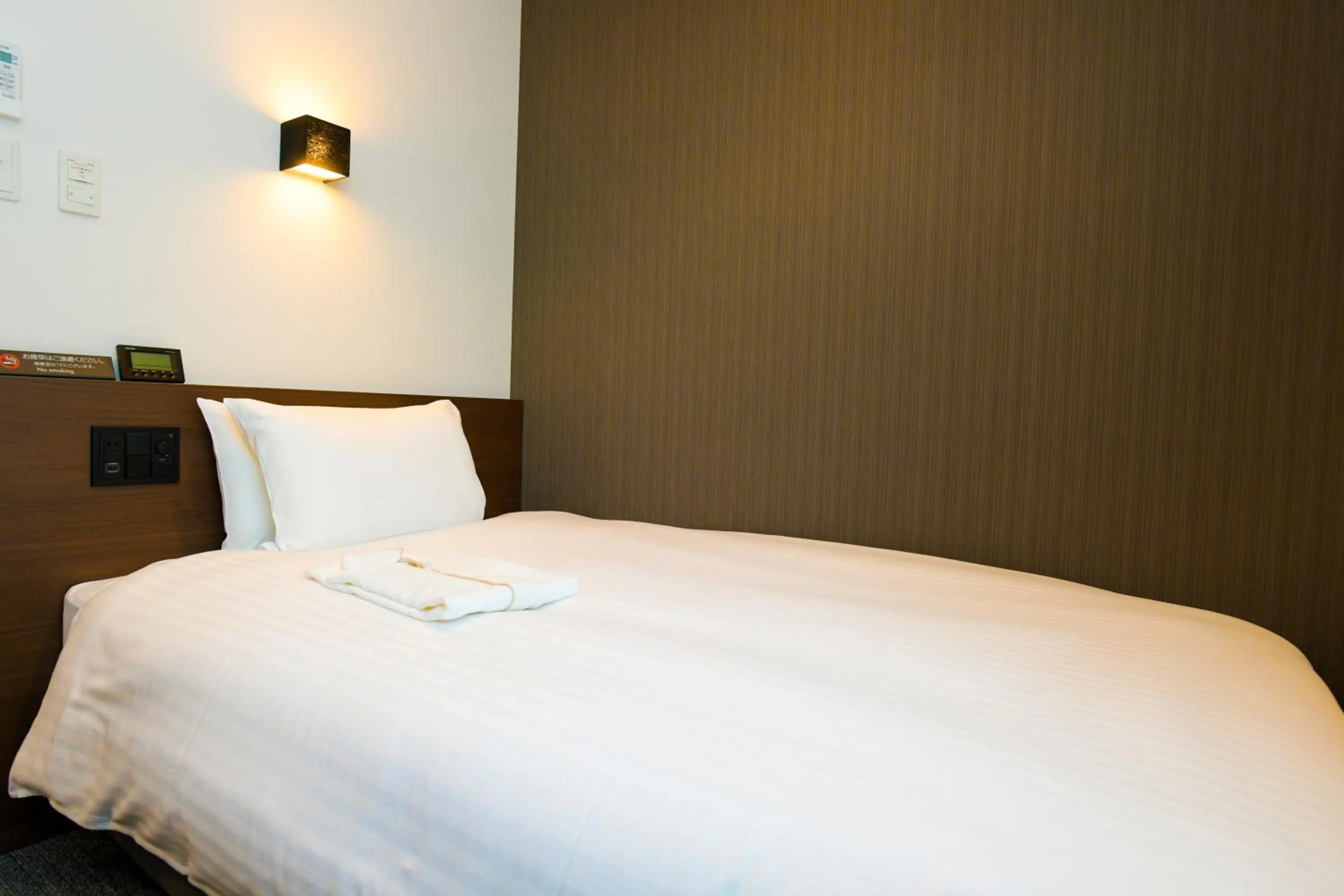 Bed in YOU STYLE HOTEL HAKATA