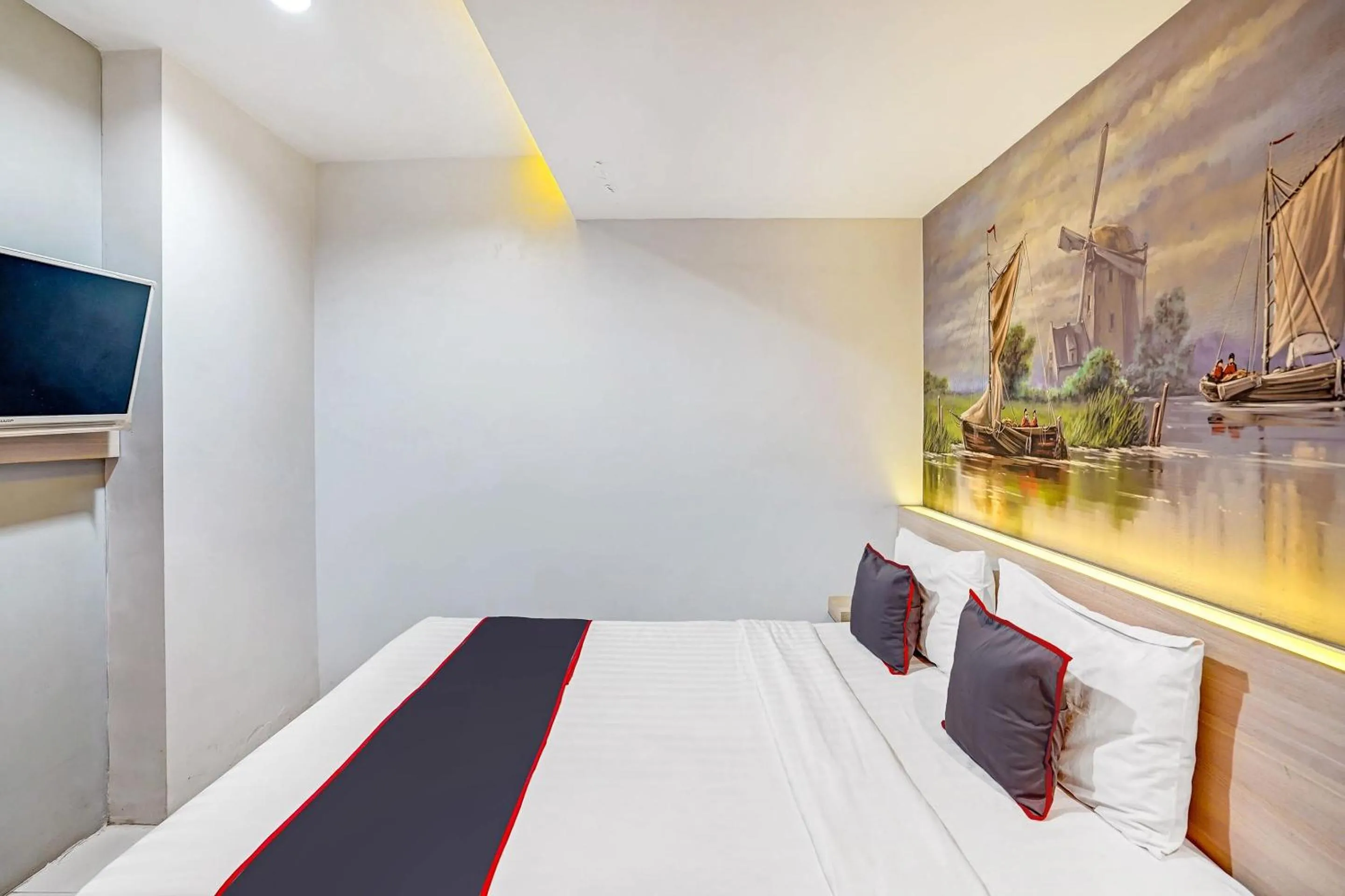 Bedroom in Capital O 90888 Bintang Diponggo Residence