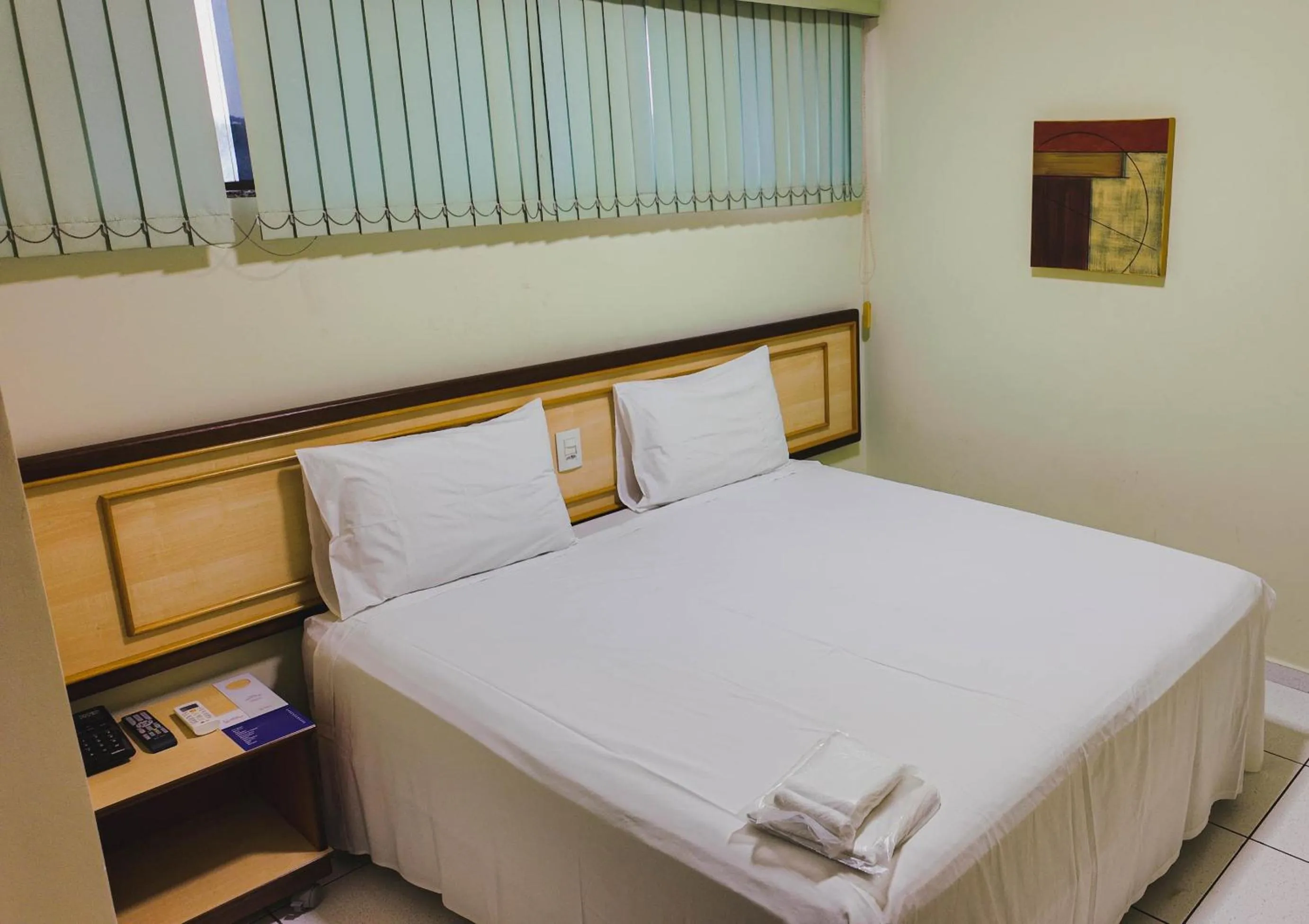 Lobby or reception, Bed in Larison Ji-Paraná by - Easy Hotéis