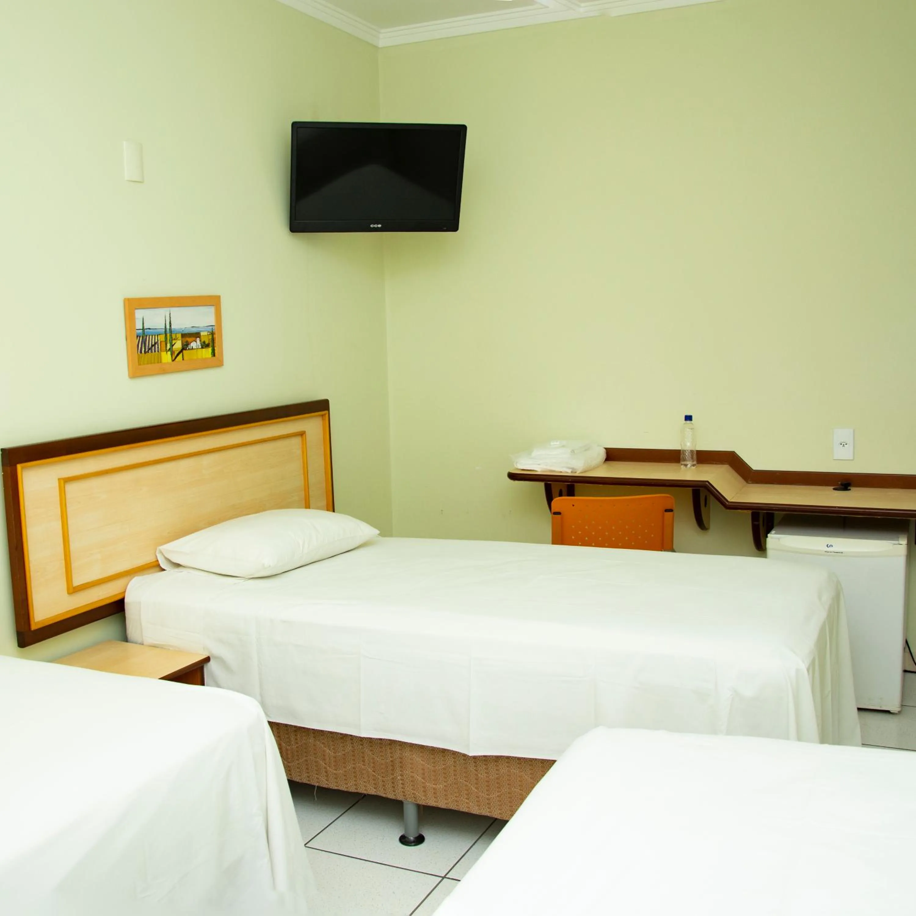 Bed in Larison Ji-Paraná by - Easy Hotéis