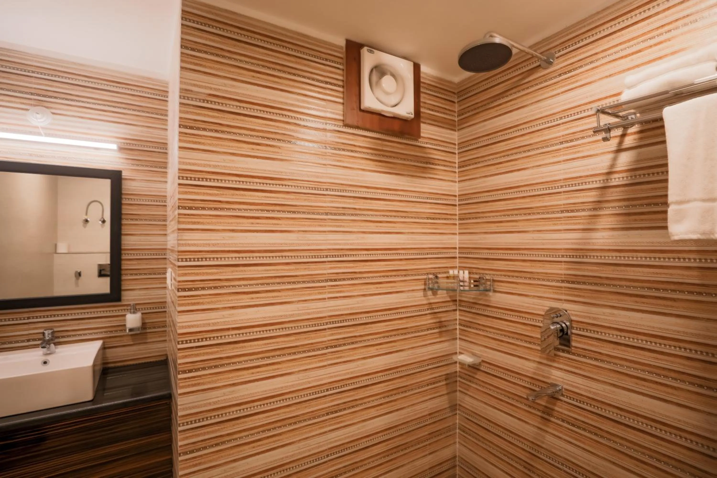 Bathroom in Regenta Resort Madhuganga Ukhimath