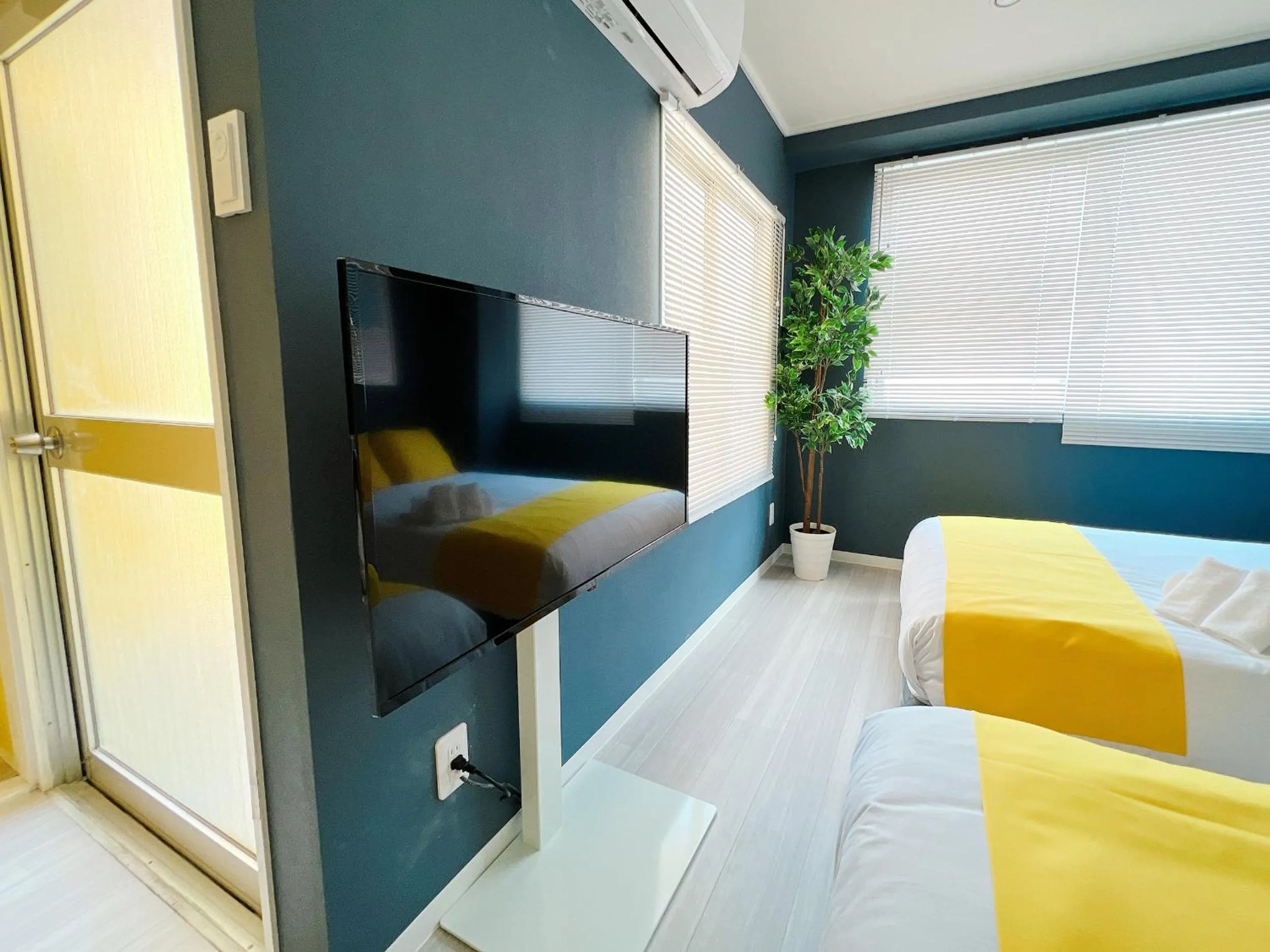 Bed in OUCHI HOTEL Nagarekawa with Dogs