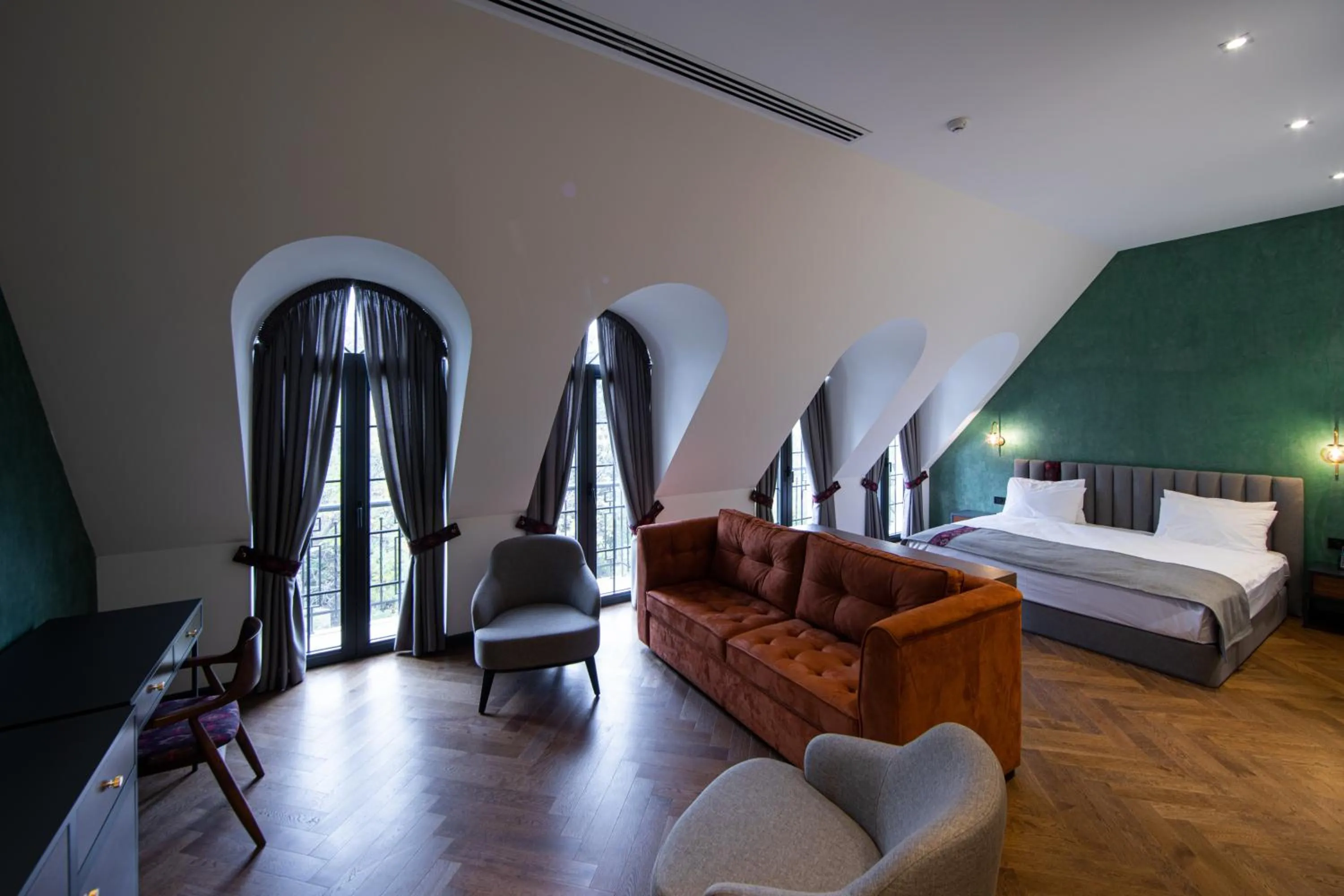 Living room, Bed in Molokan Inn Hotel