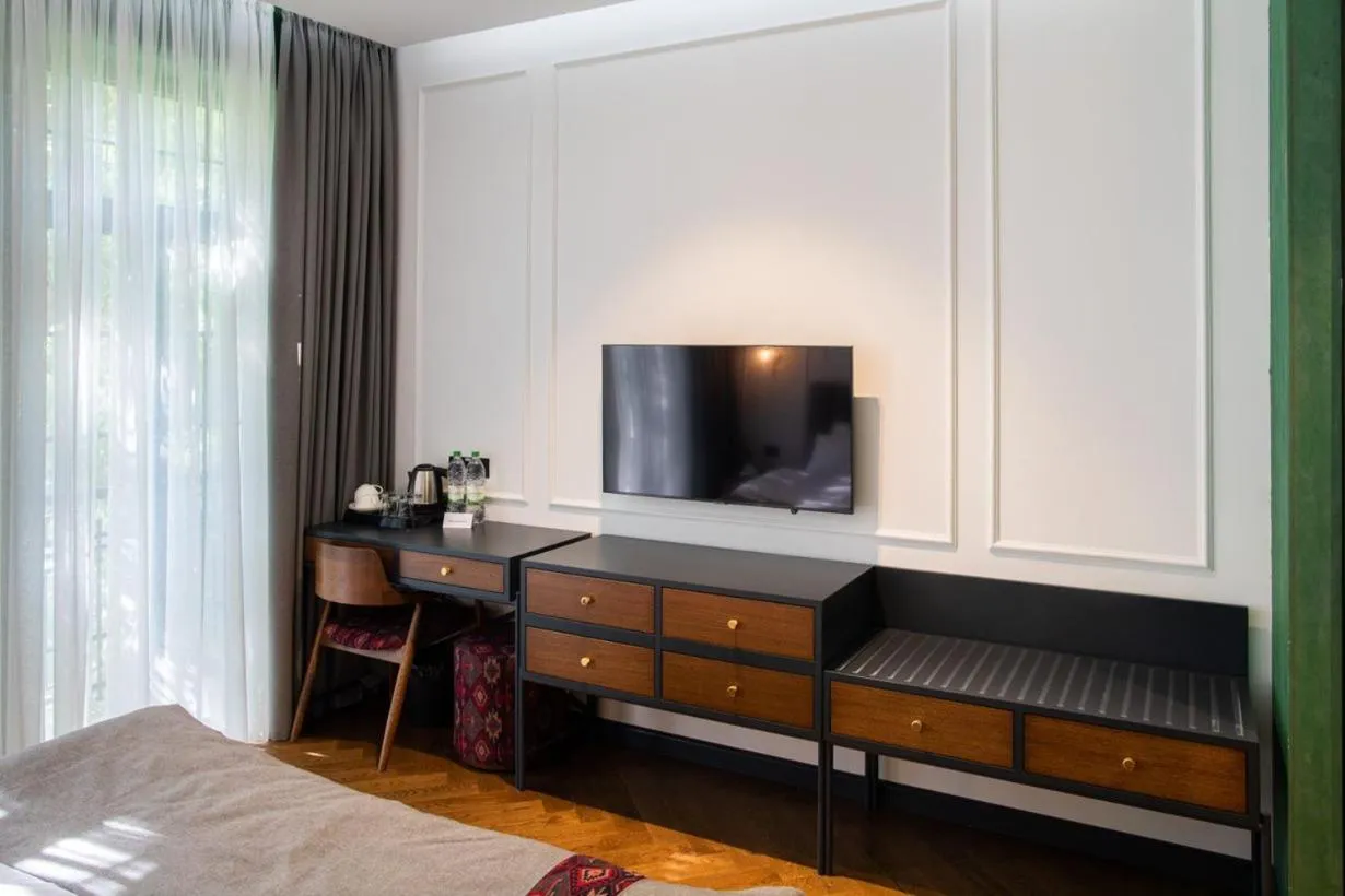 TV and multimedia, Bed in Molokan Inn Hotel