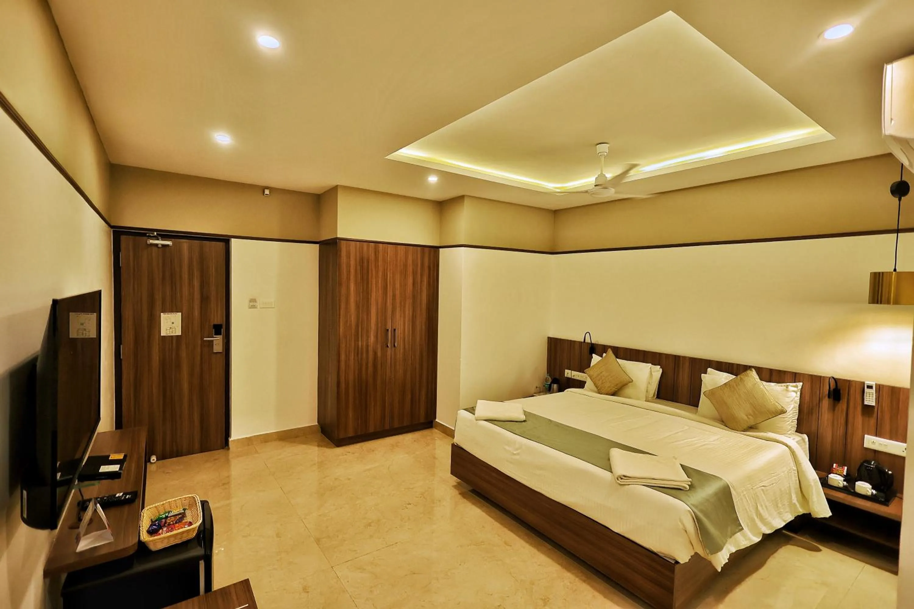 Communal lounge/ TV room, Bed in CORAL RESIDENCY