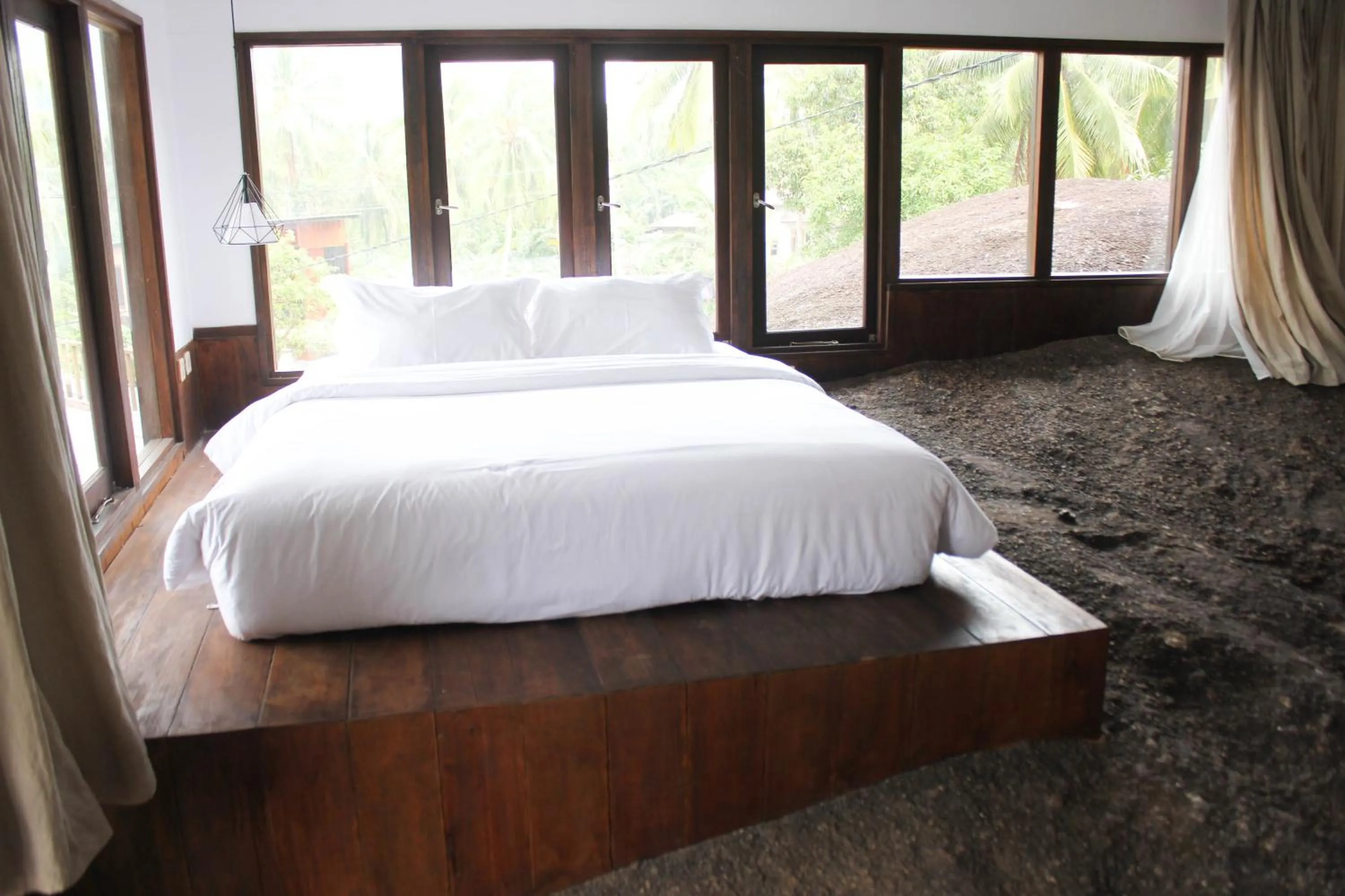 Bed in Natuna Dive Resort