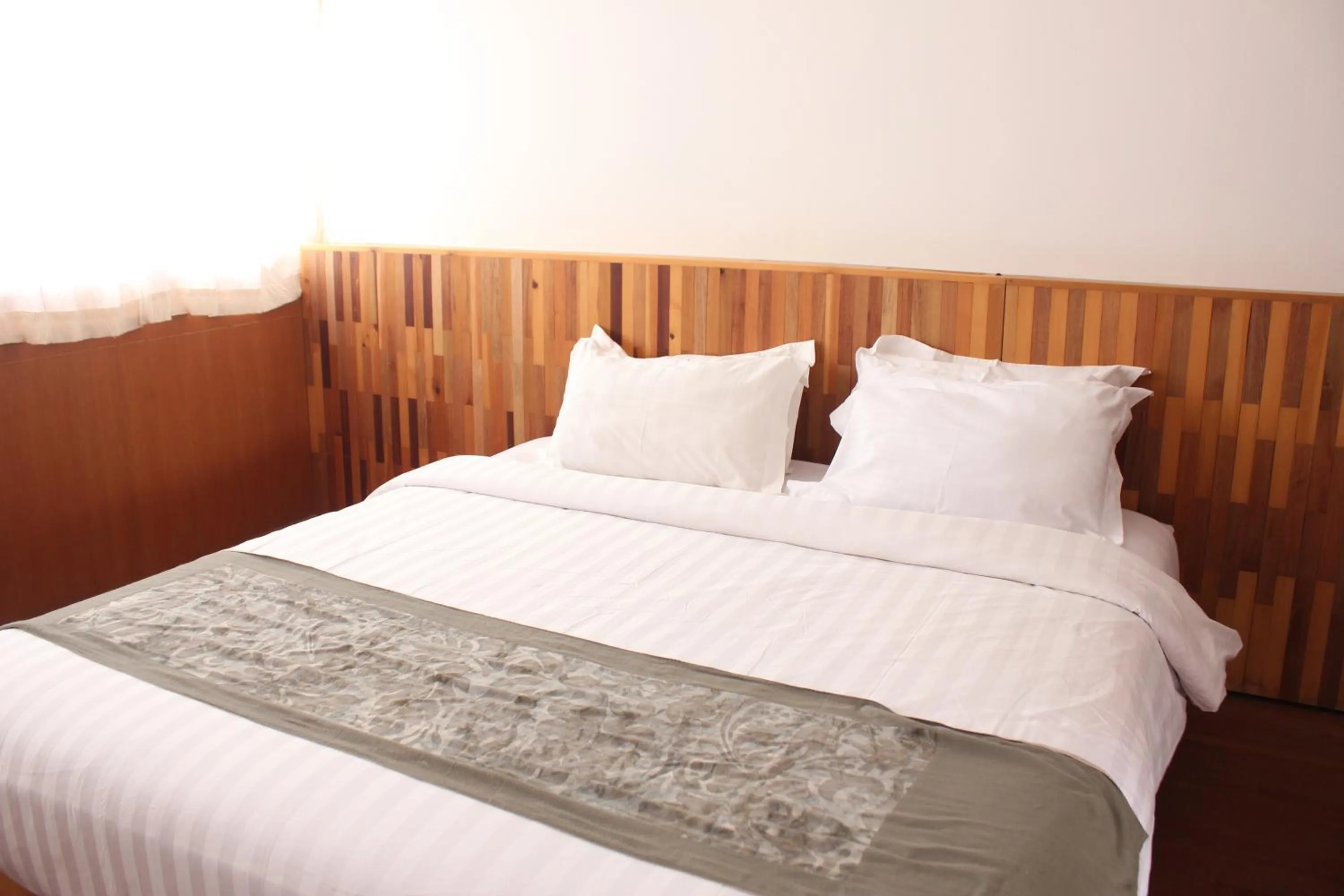 Bed in Natuna Dive Resort