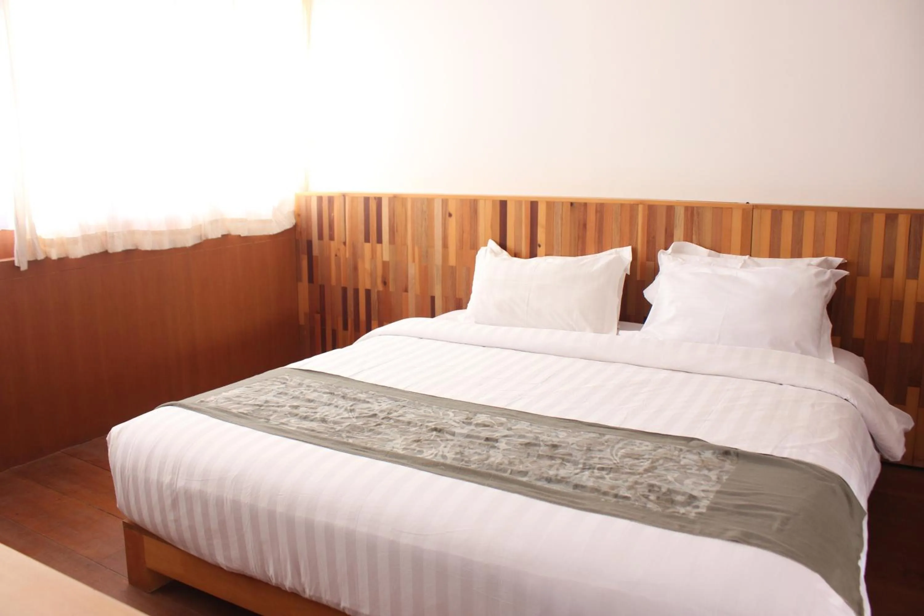 Bed in Natuna Dive Resort