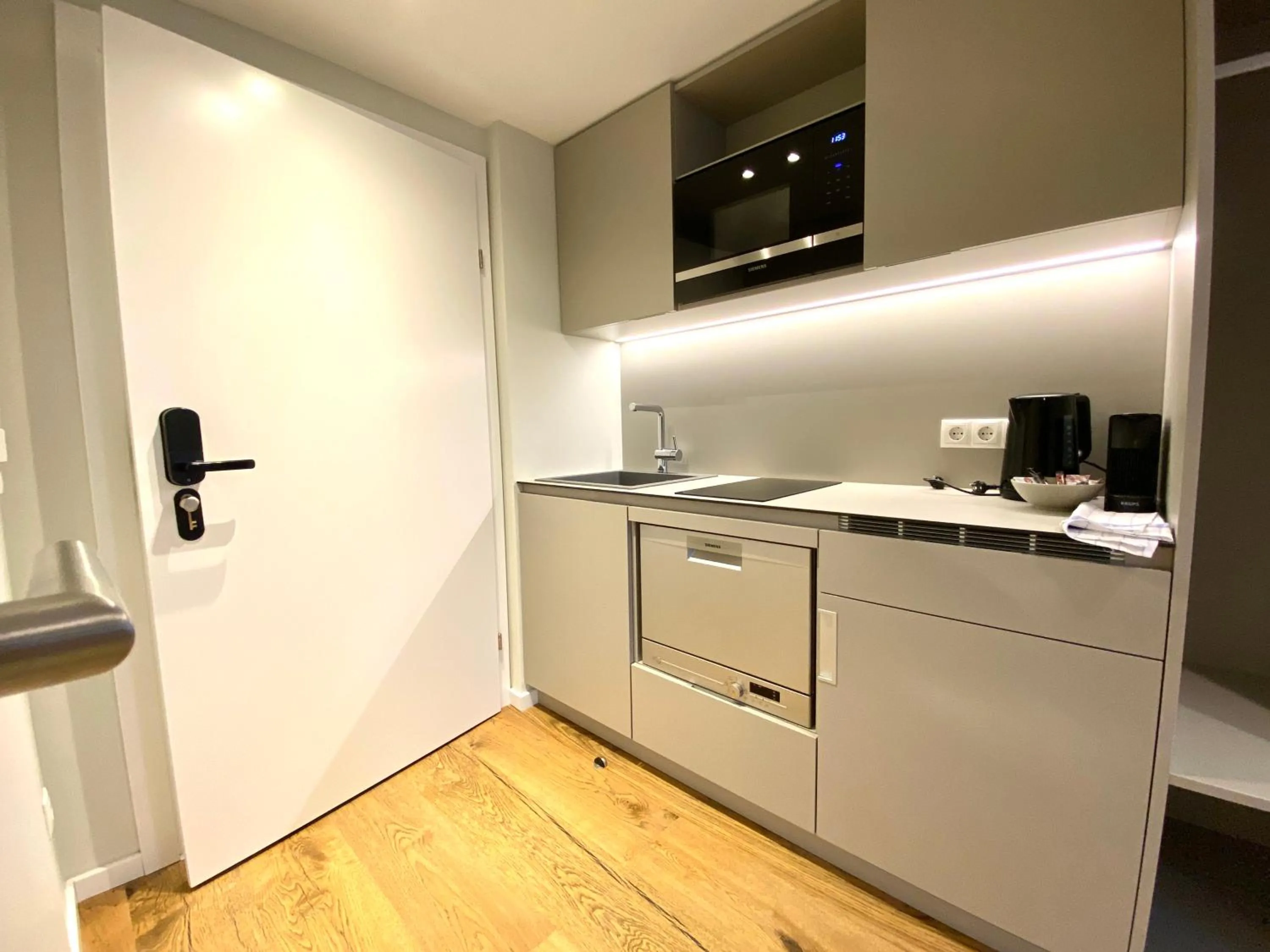 Kitchen or kitchenette in Blackhome Wien I contactless check-in
