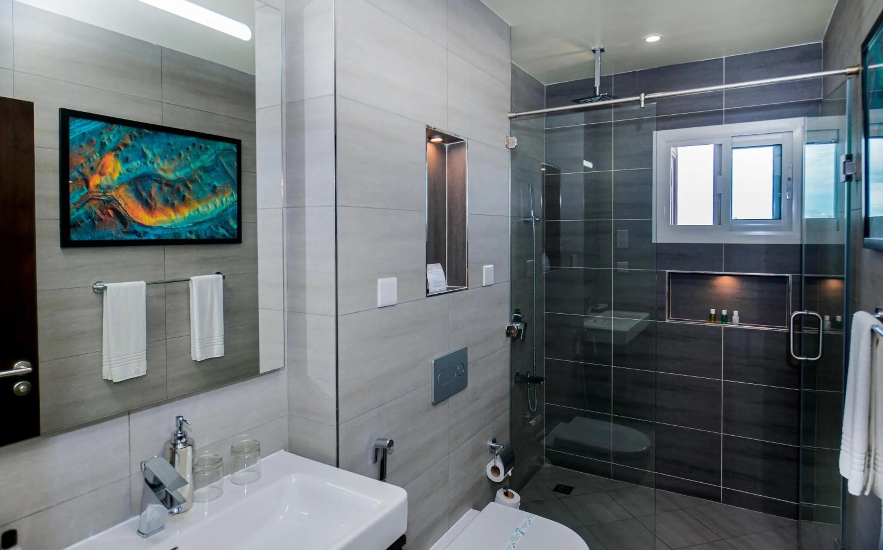 Shower in Aura Suites