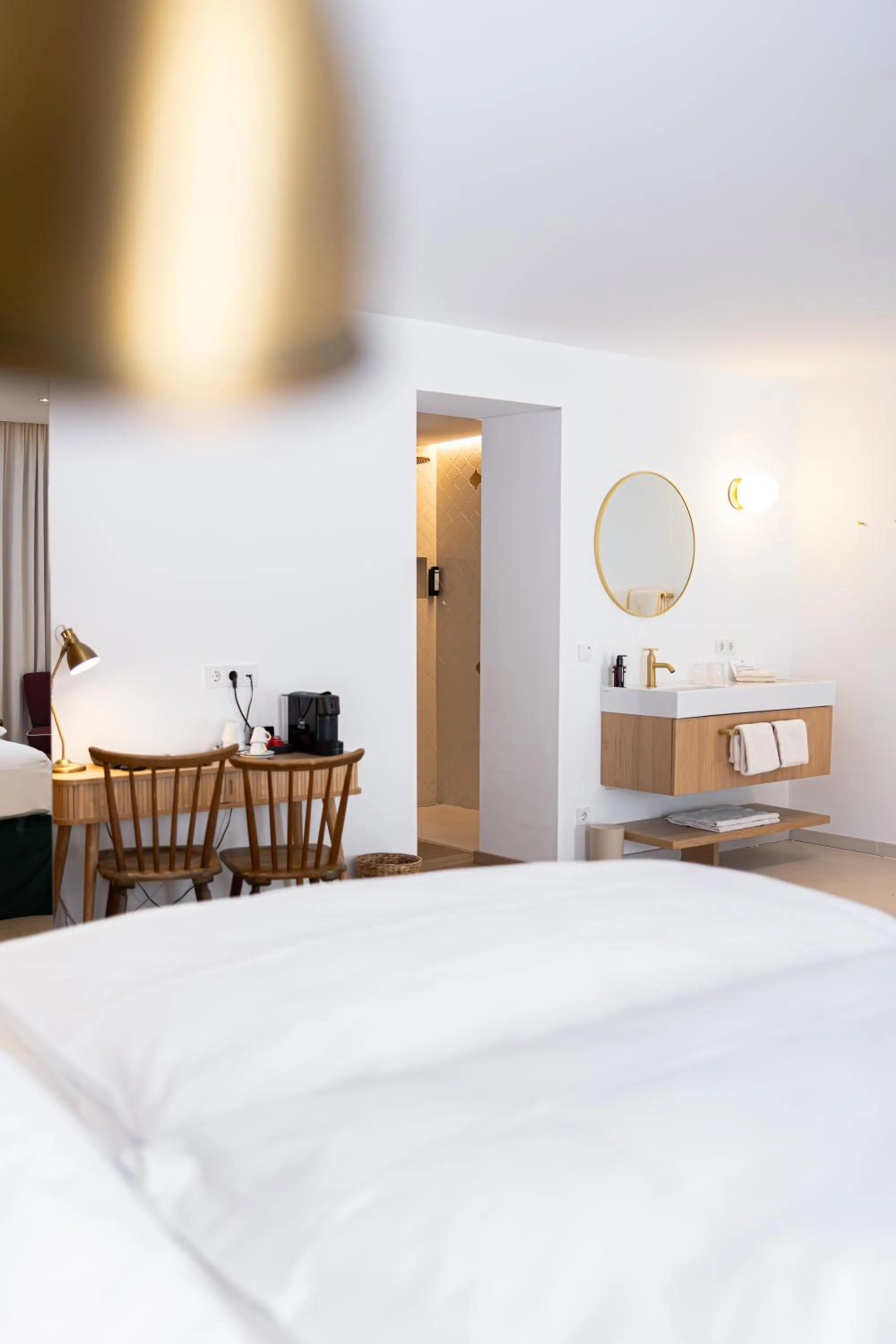 Bed in Boutiquehotel Zum Goldenen Hirschen