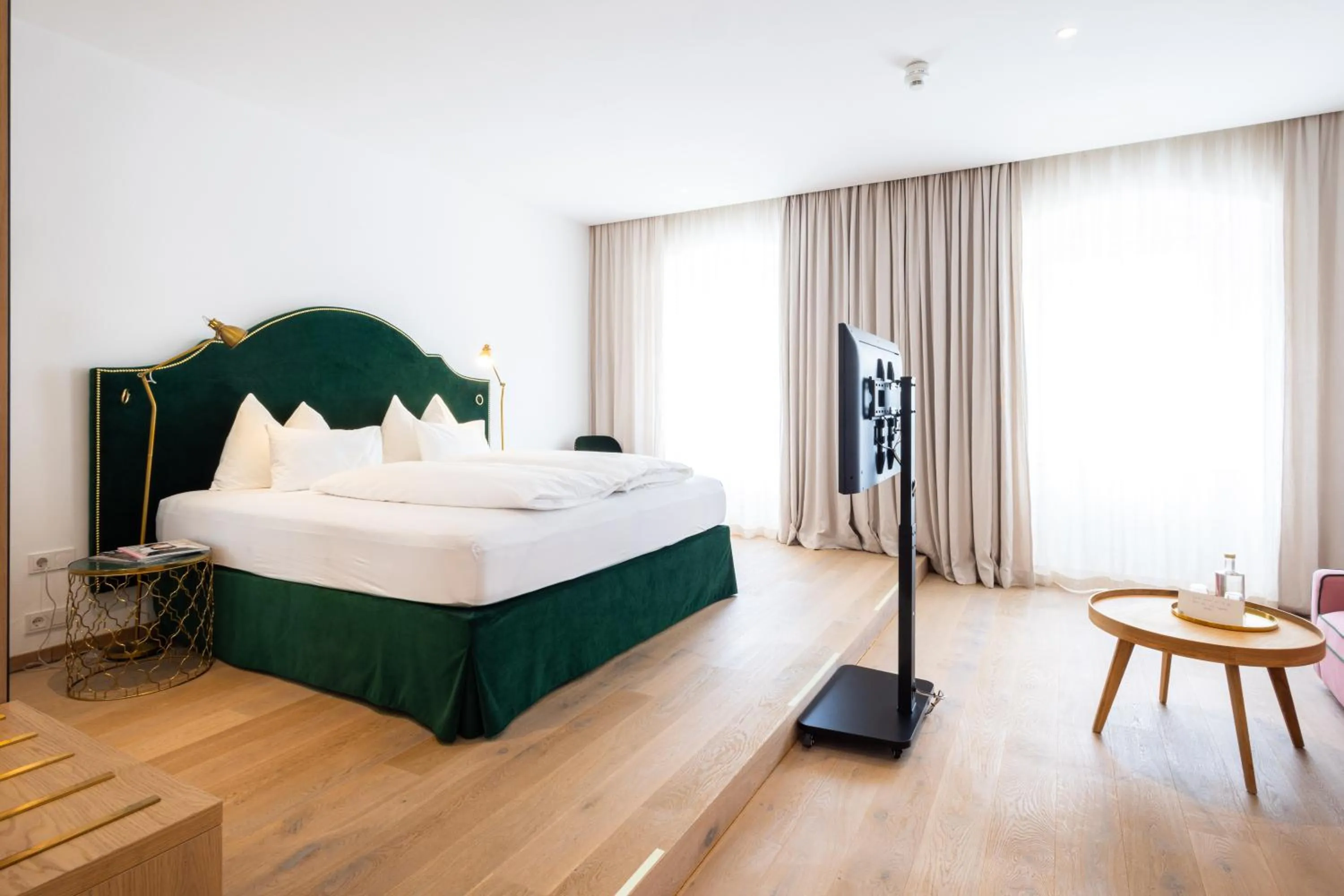 Bed in Boutiquehotel Zum Goldenen Hirschen