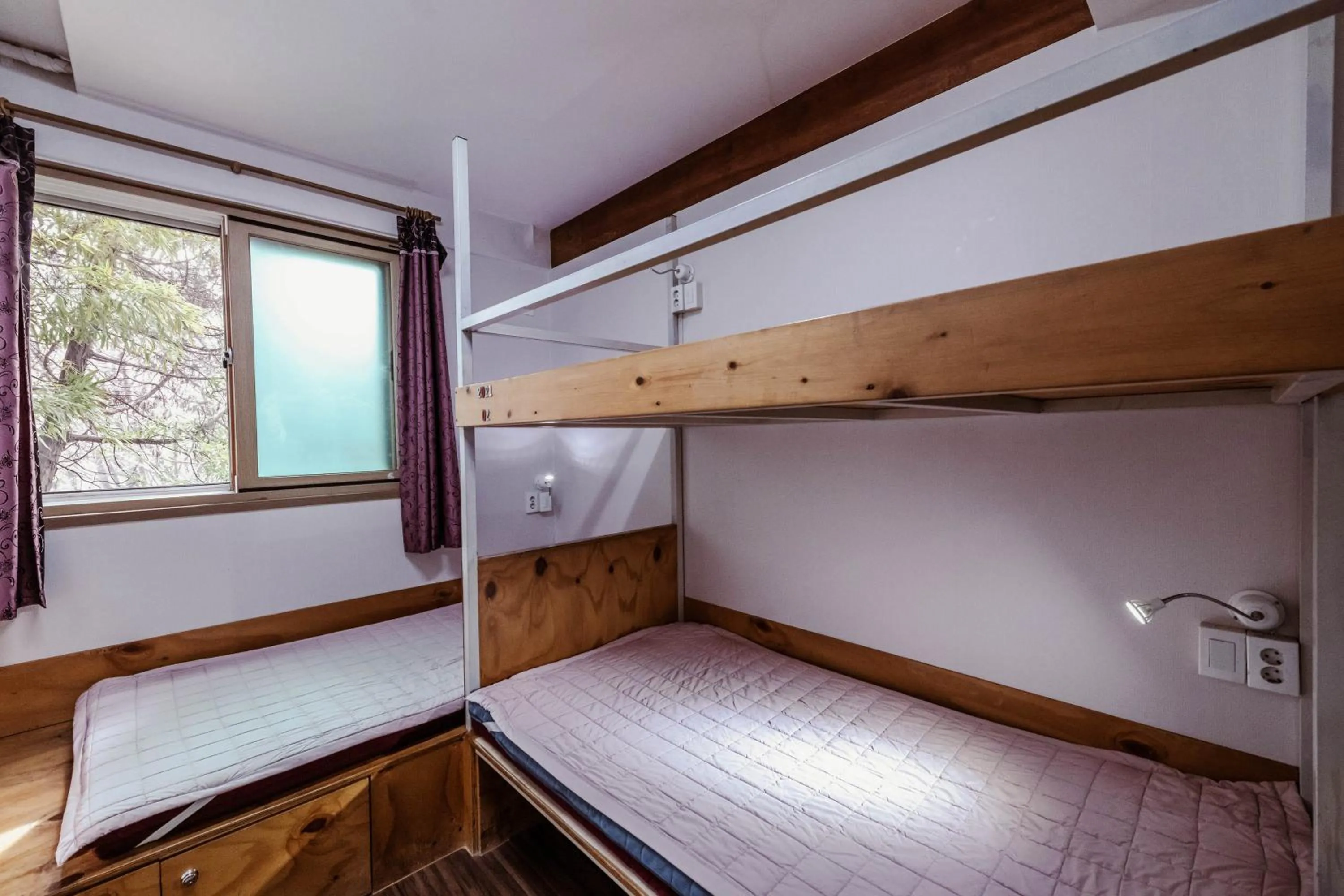 Bed in UWA Guesthouse