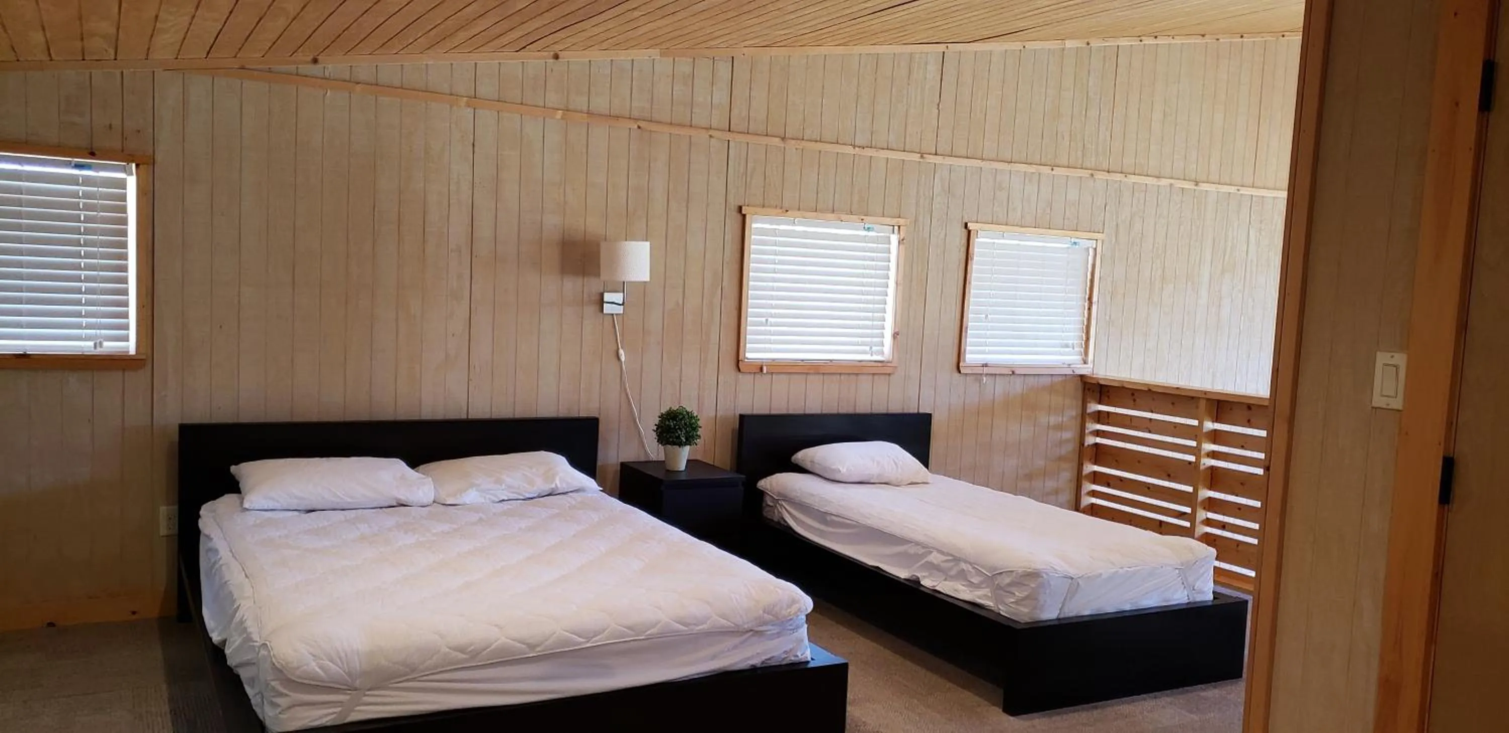 Bed in Seven Bluff Cabins