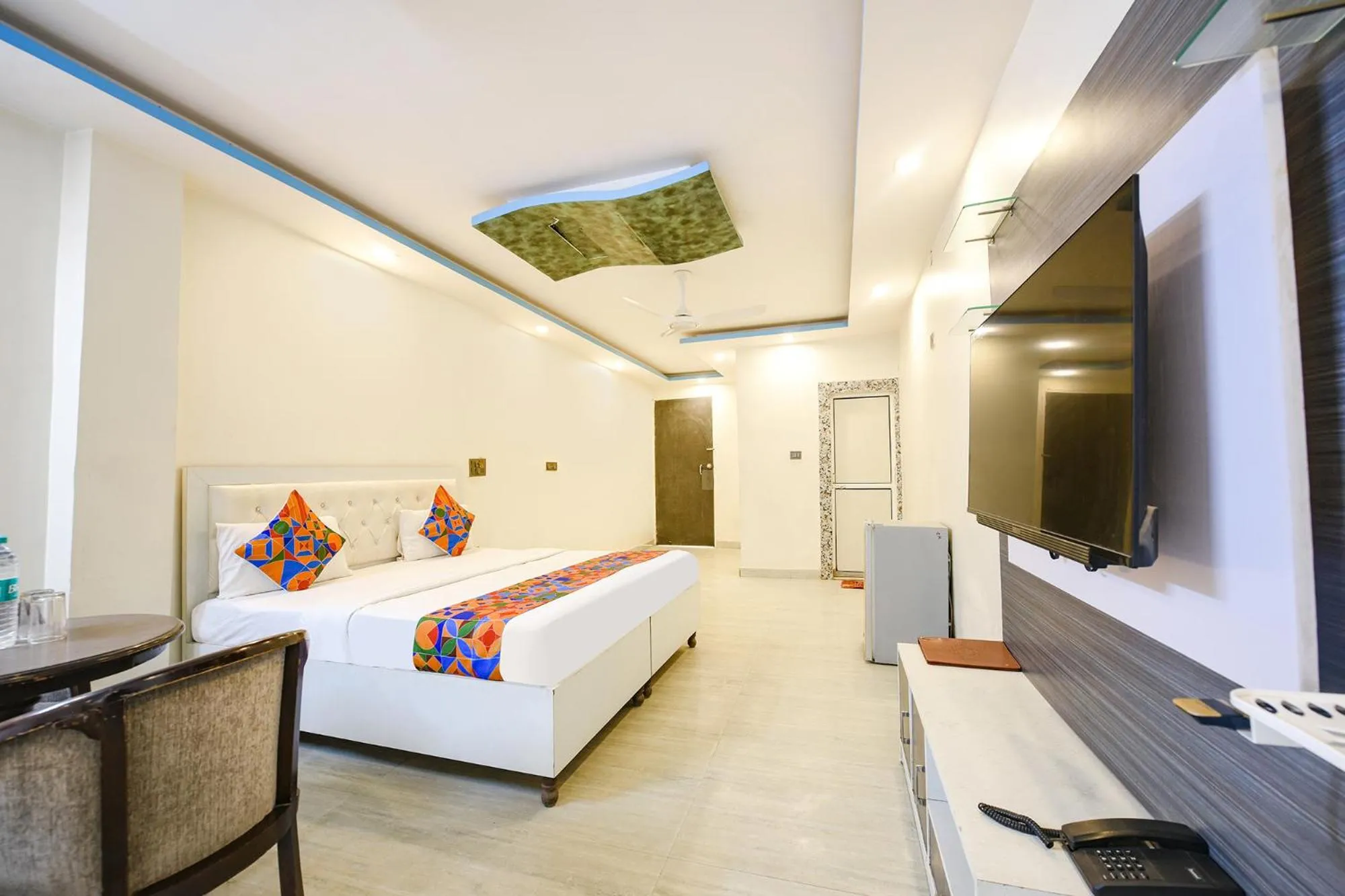 Bed in FabHotel Capital Inn