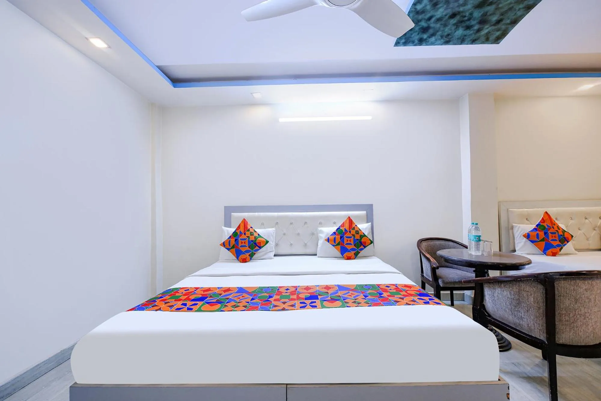 Bed in FabHotel Capital Inn