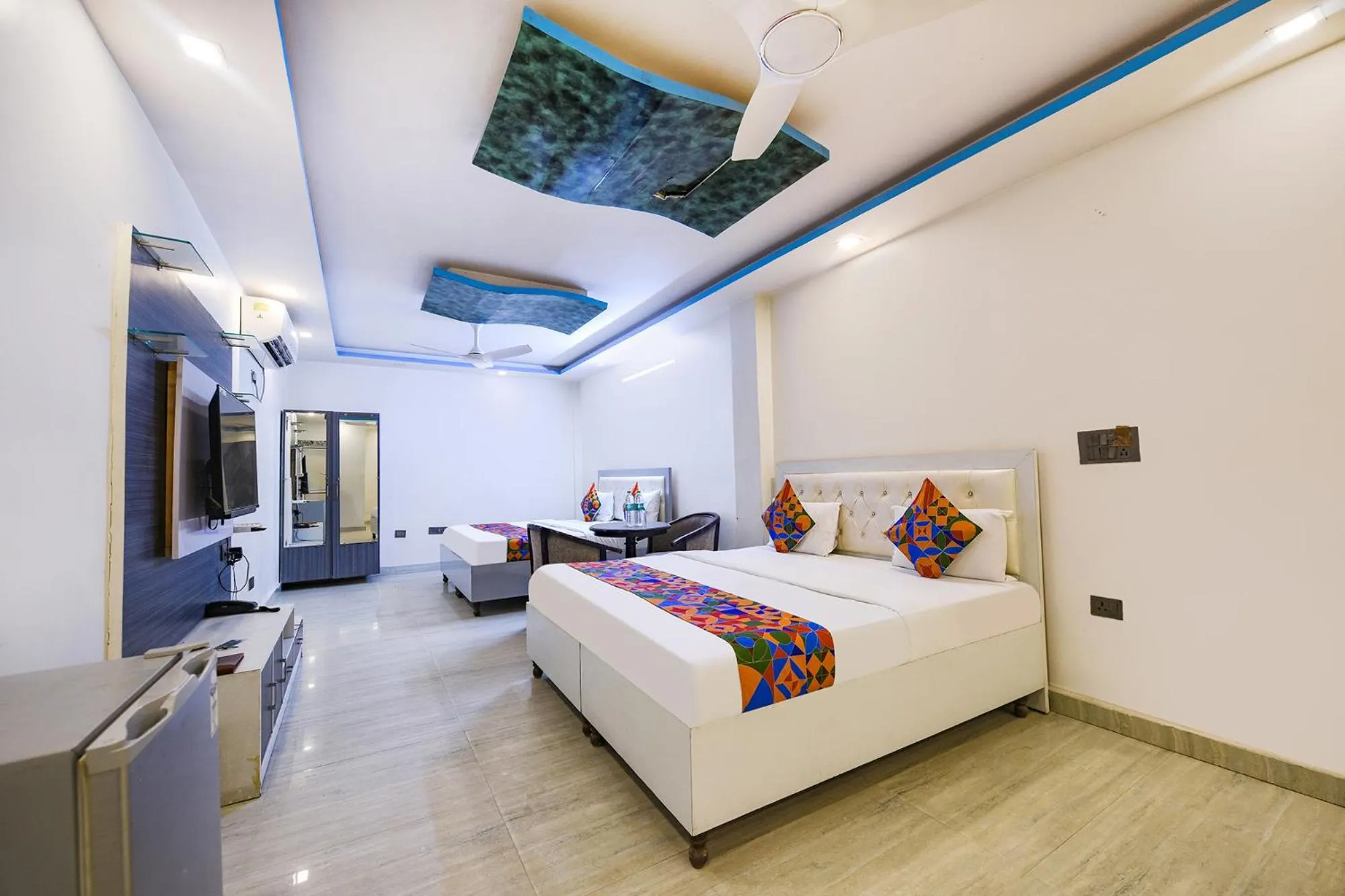 Bed in FabHotel Capital Inn