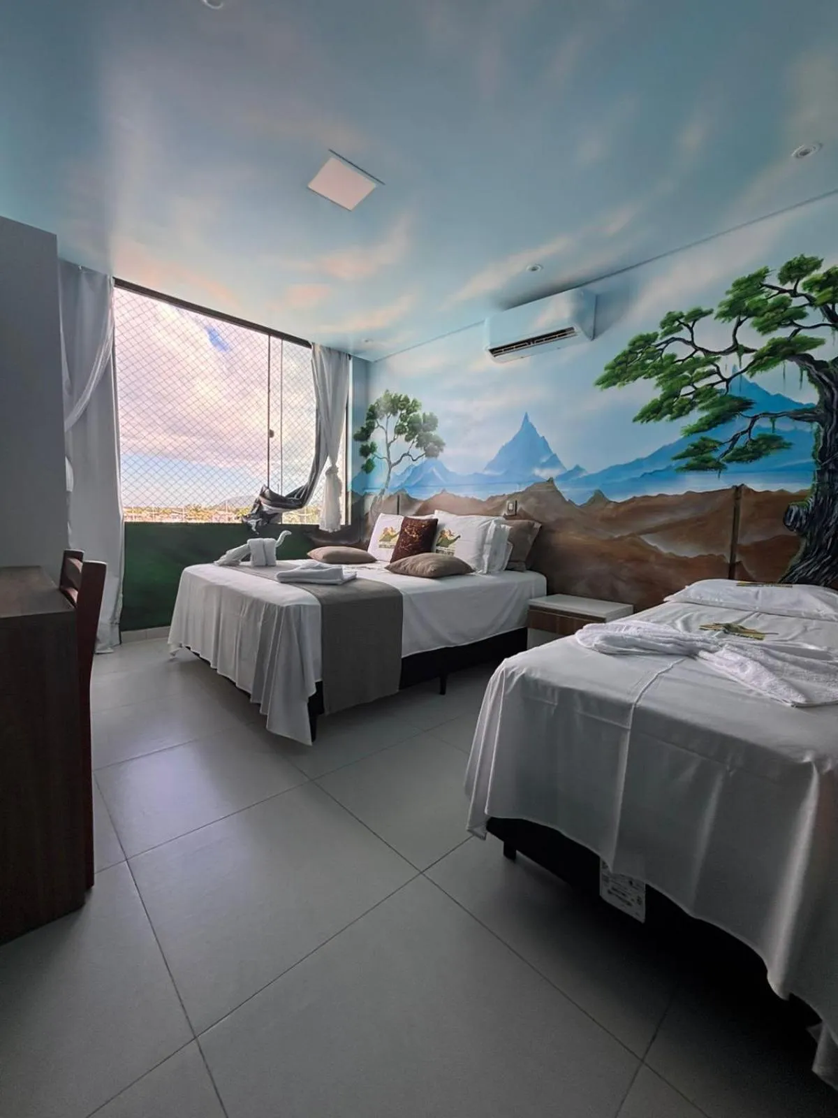 Bed in Hotel Recanto dos Dinossauros