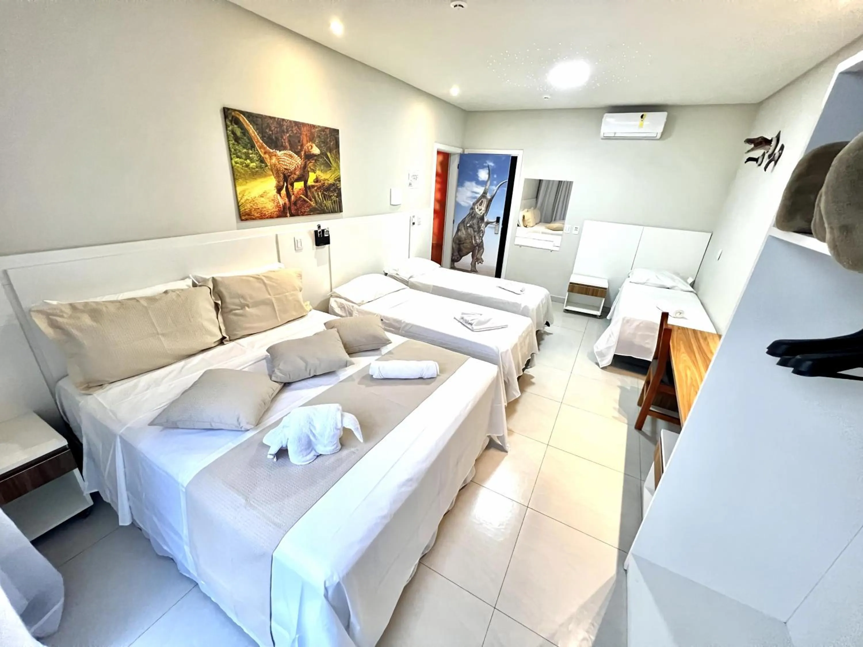 Bed in Hotel Recanto dos Dinossauros