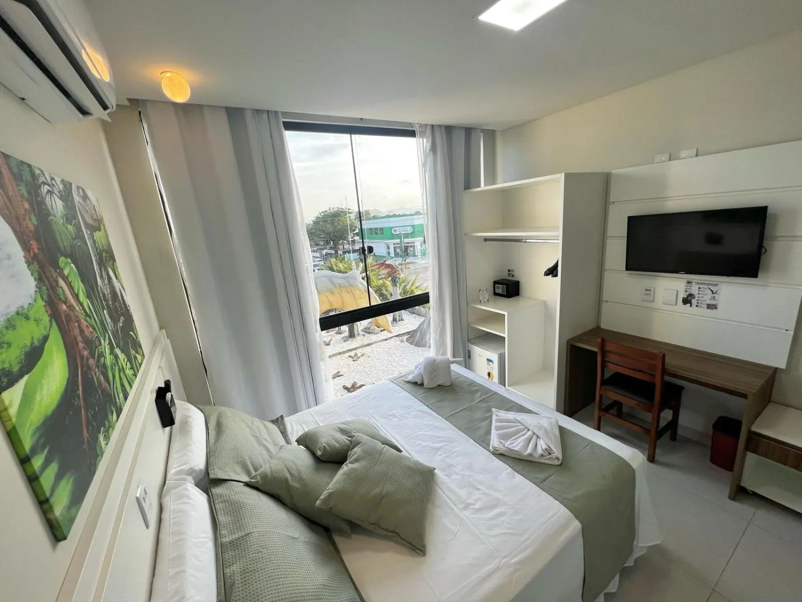 Bed in Hotel Recanto dos Dinossauros