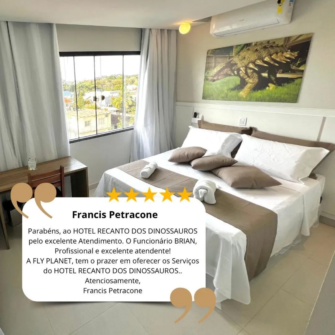 Bed in Hotel Recanto dos Dinossauros