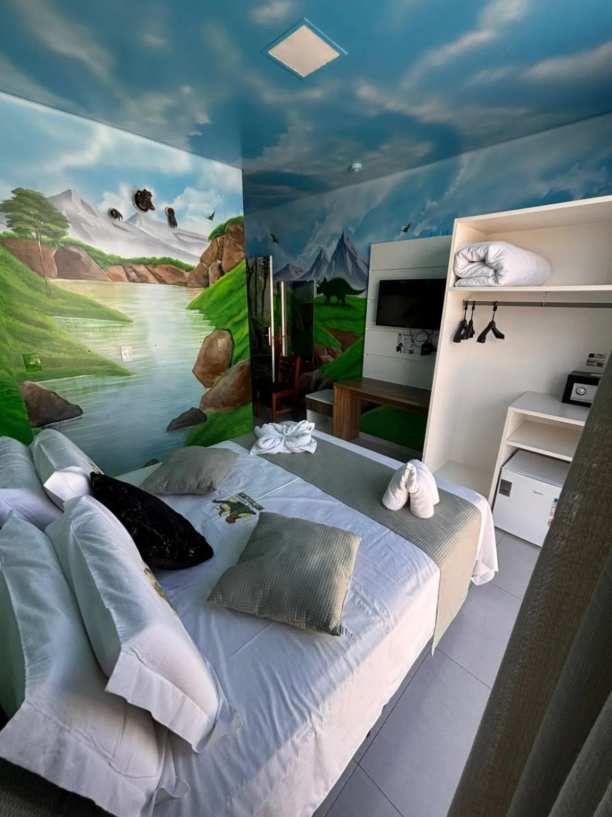 Bed in Hotel Recanto dos Dinossauros