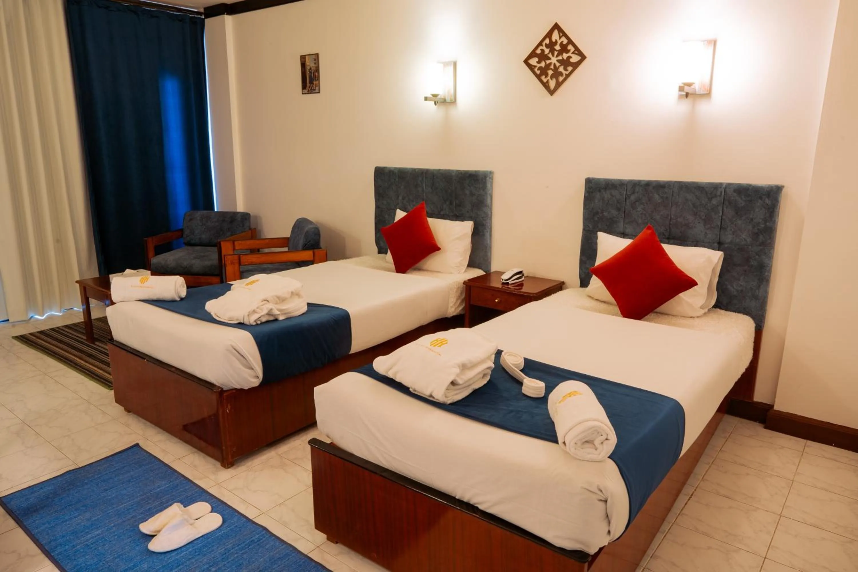 Photo of the whole room, Bed in El Khan Sharm Hotel