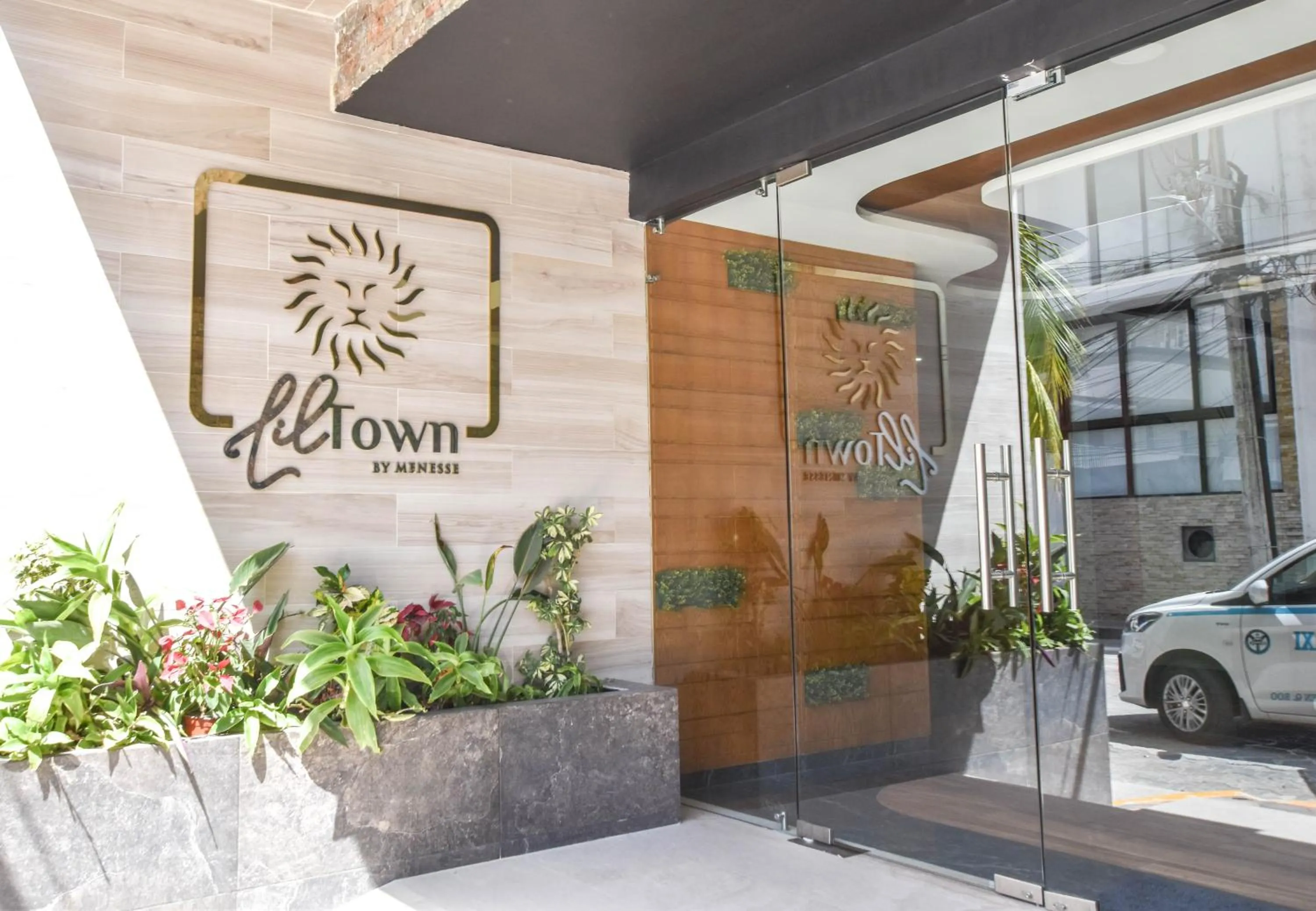 Property logo or sign in Lil town Menesse by Casago