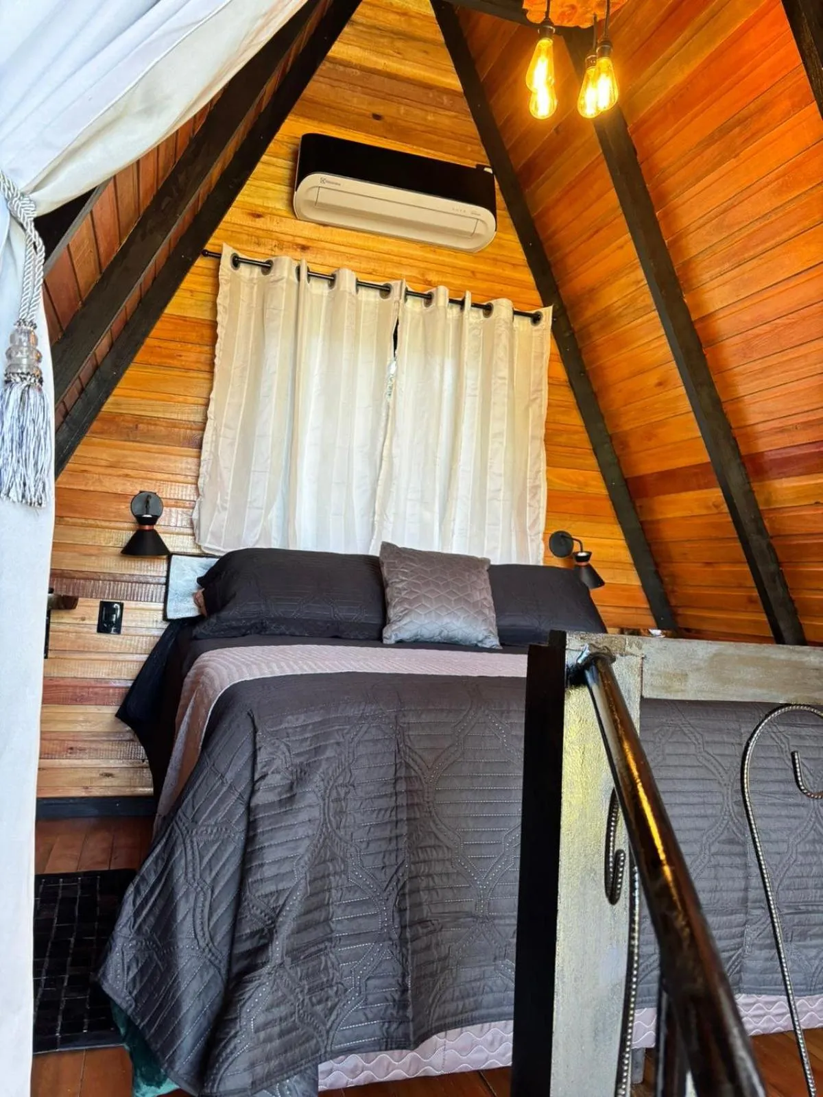 Bed in Chalés Corucacas