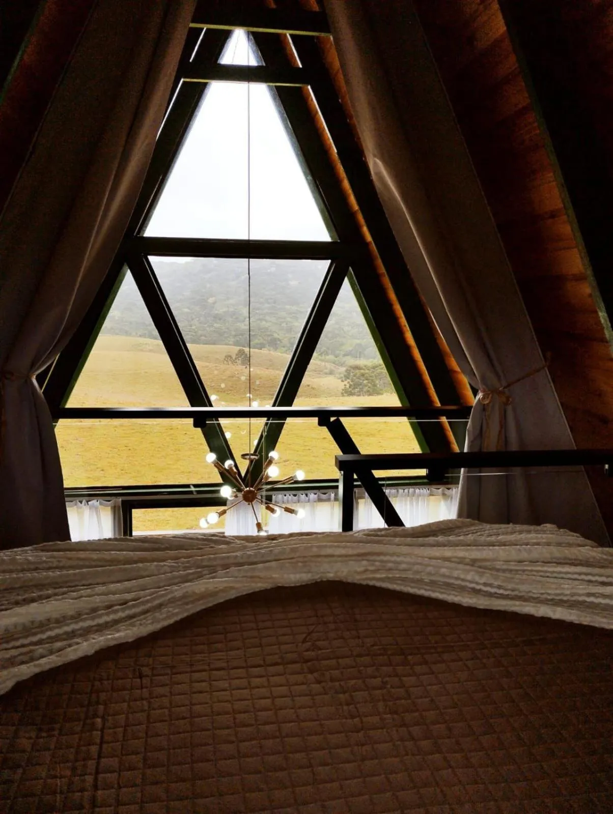 Bed in Chalés Corucacas