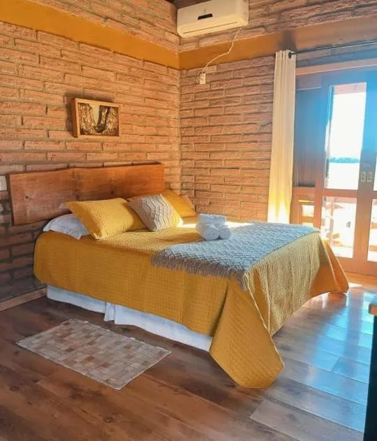 Bed in Chalés Corucacas