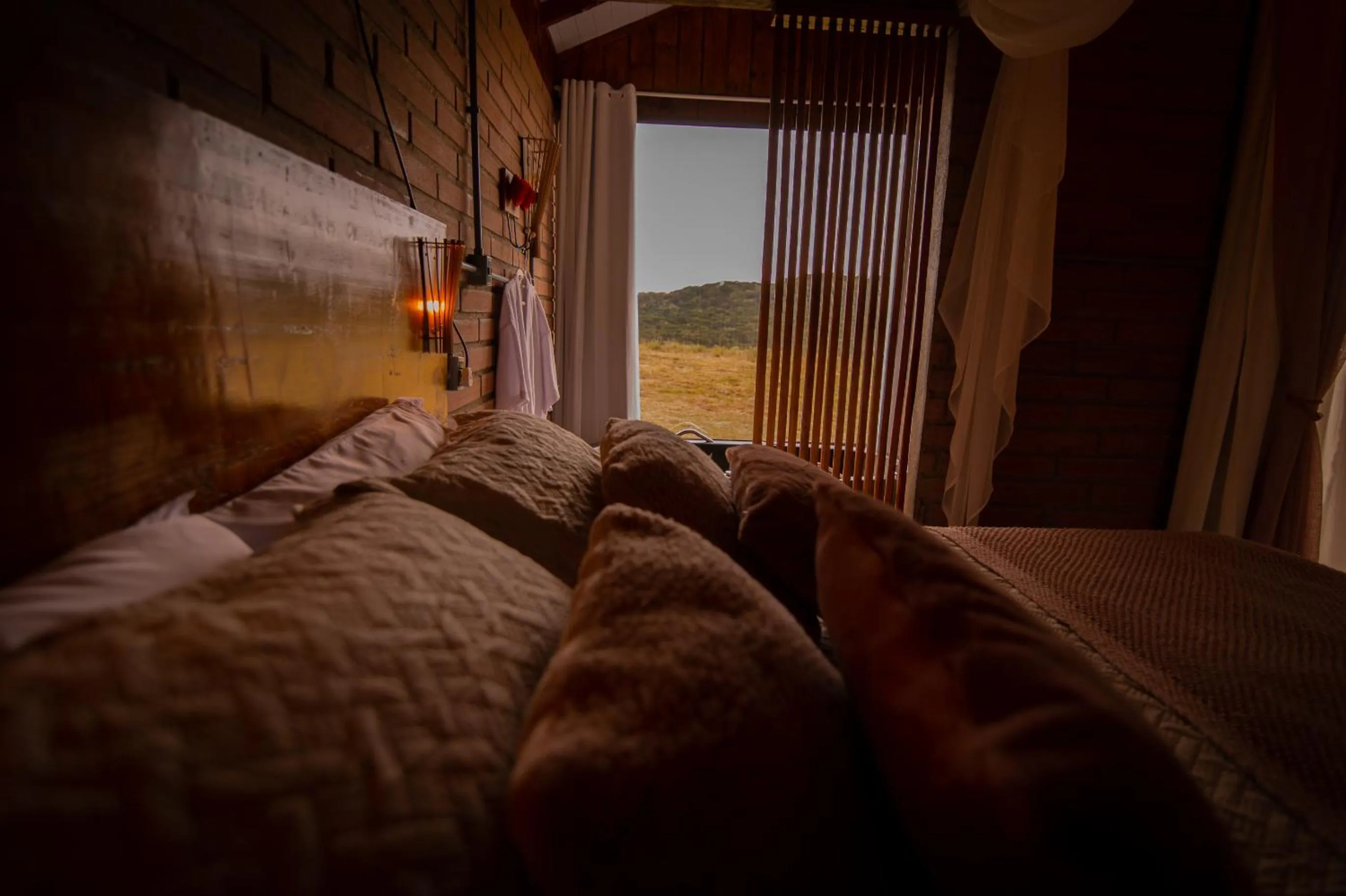 Bed in Chalés Corucacas