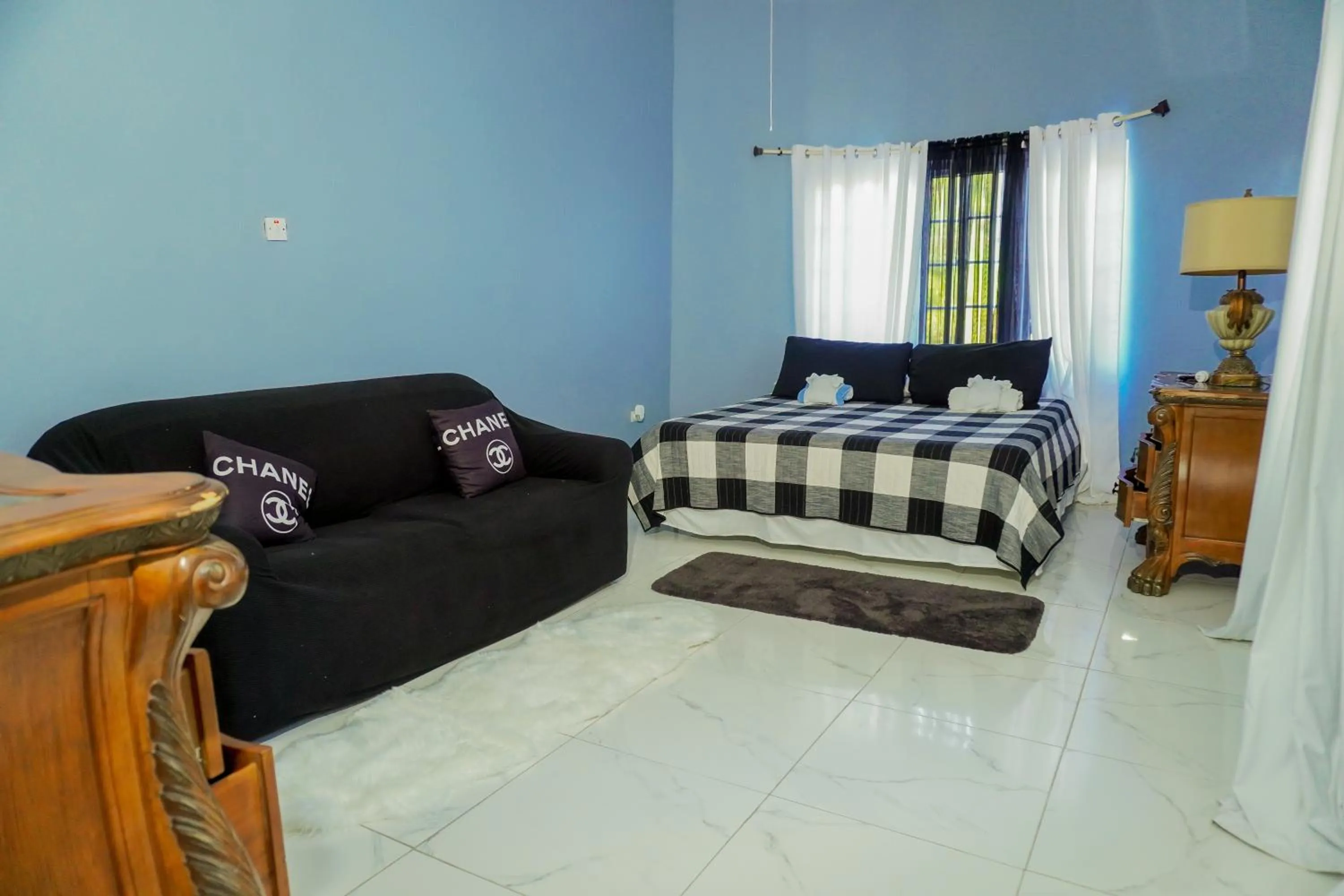 Bed in A taste of Jamaica Lavern’s Place