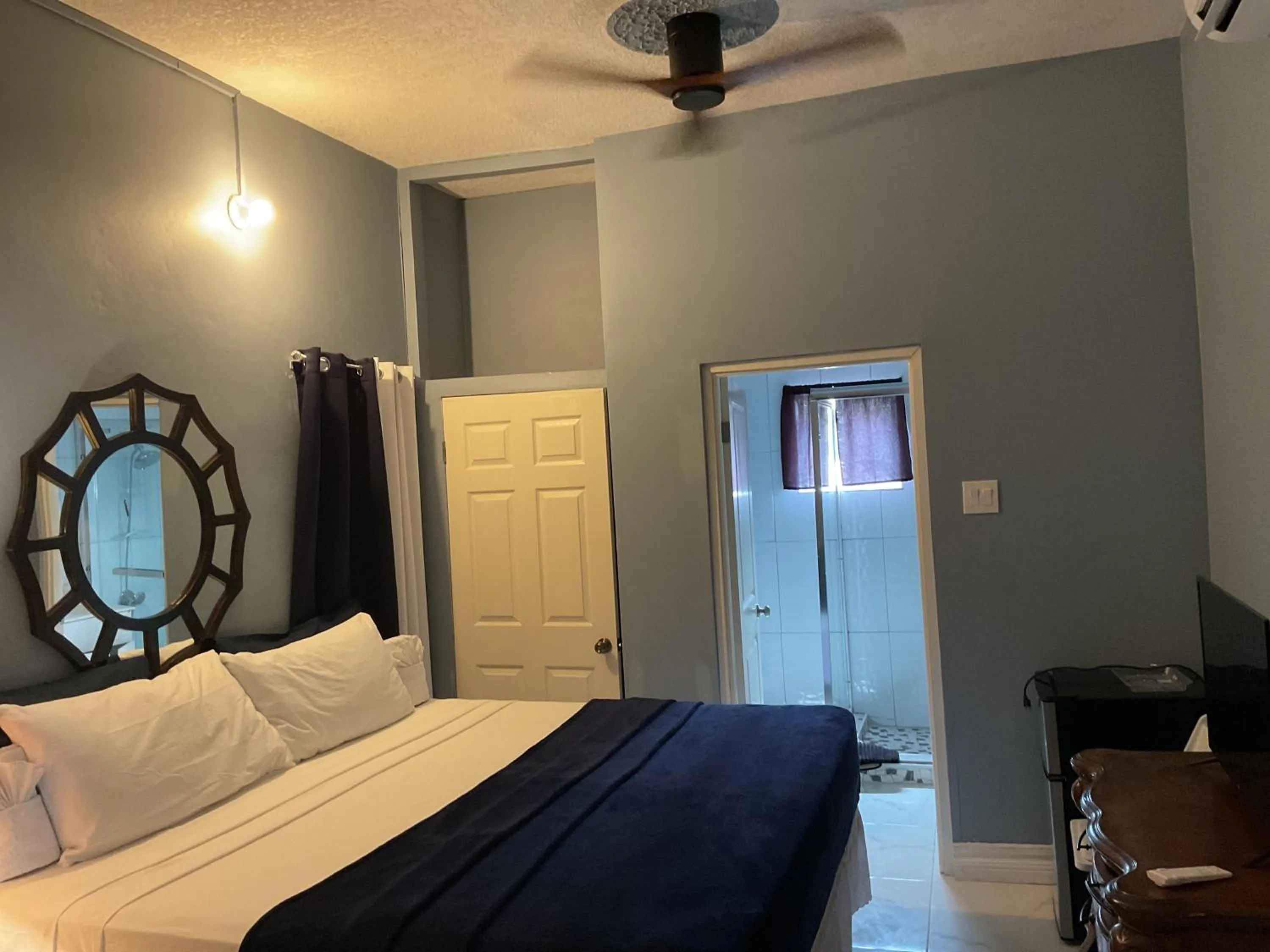 Bed in A taste of Jamaica Lavern’s Place