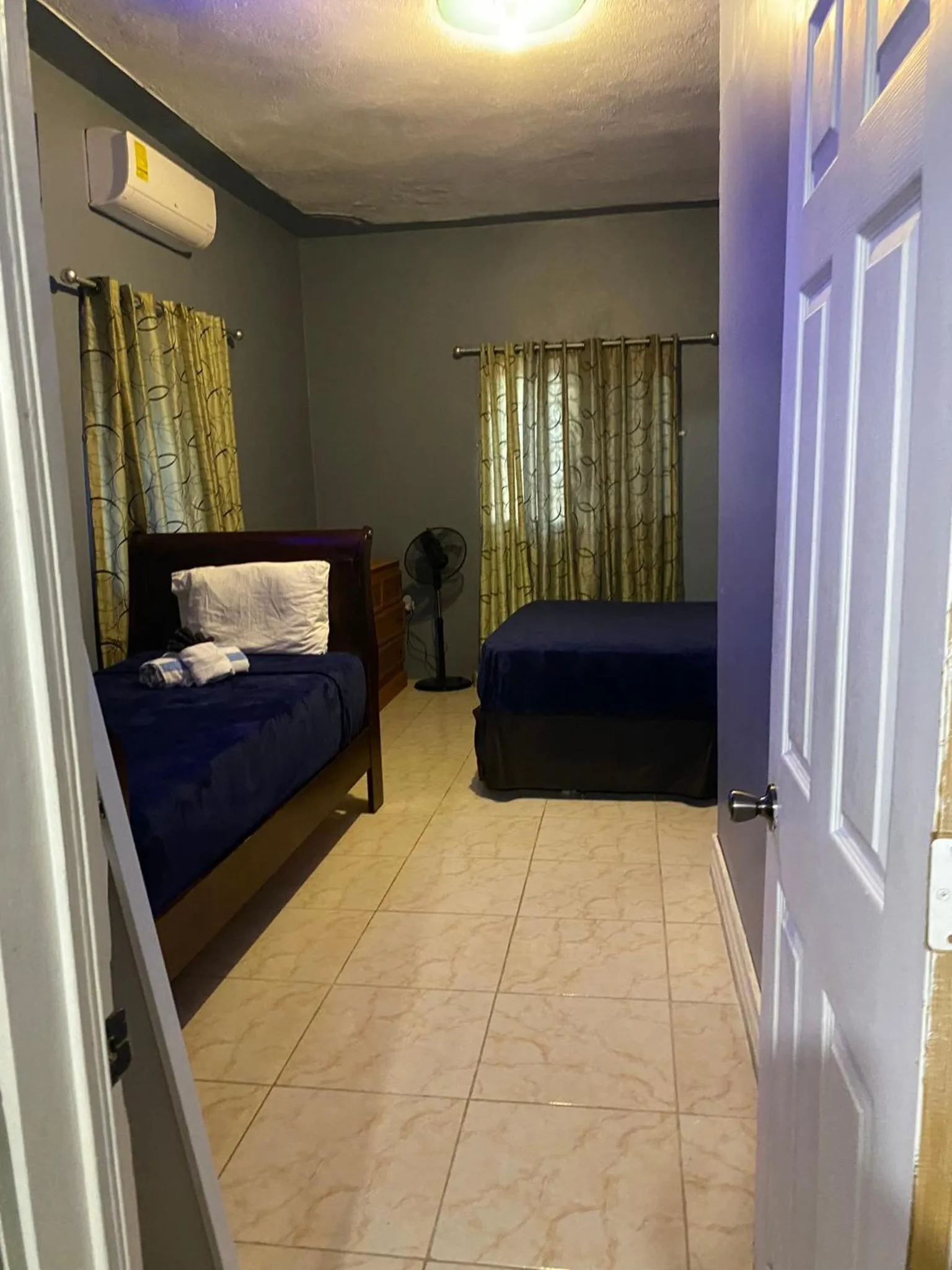 Bed in A taste of Jamaica Lavern’s Place