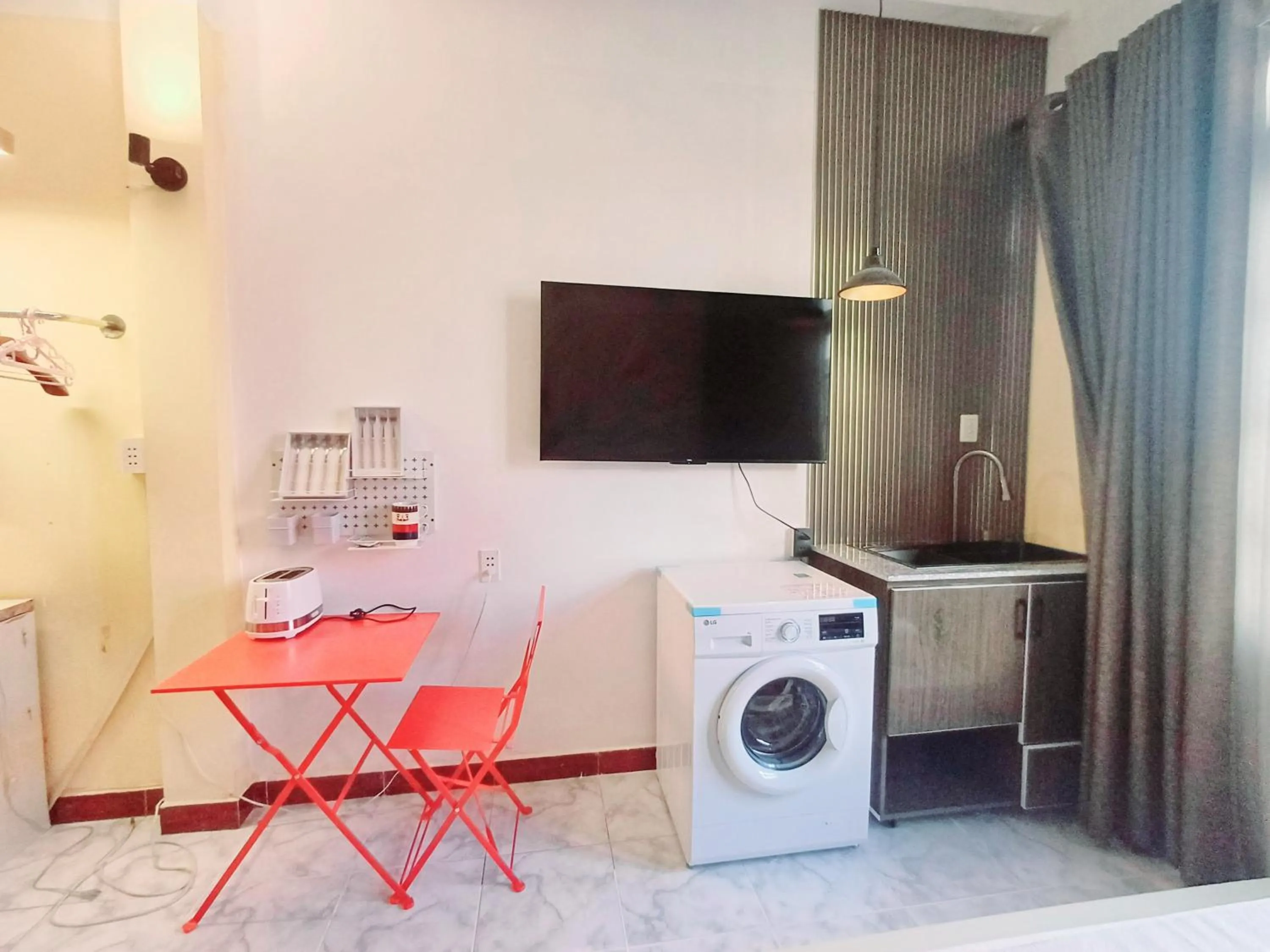 Kitchen or kitchenette in Homestay Hostel Apartment Minh Lộc