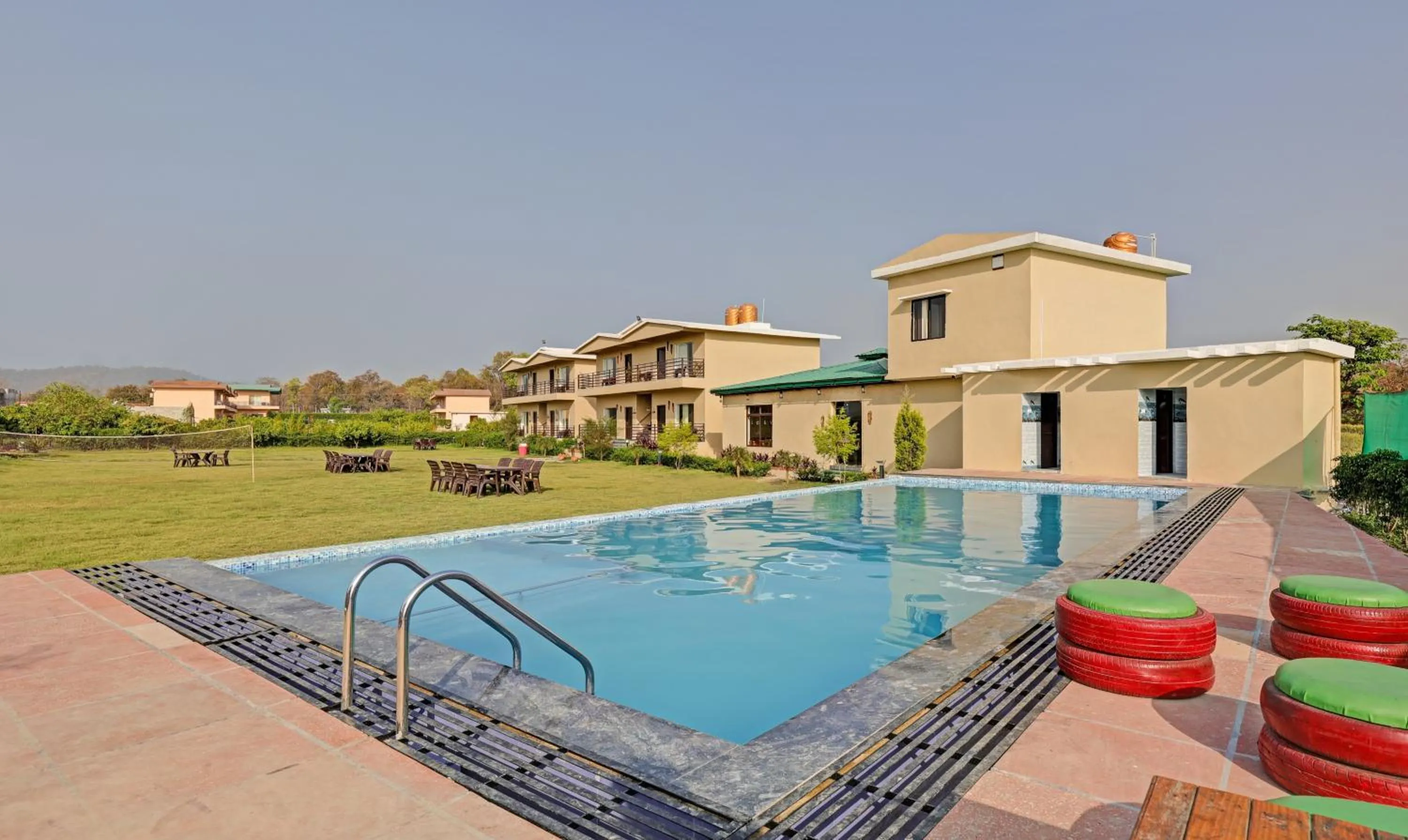 Swimming pool in Treebo Kaira Resort With Pool View, 5 Km From Jim Corbett Jungle Safari