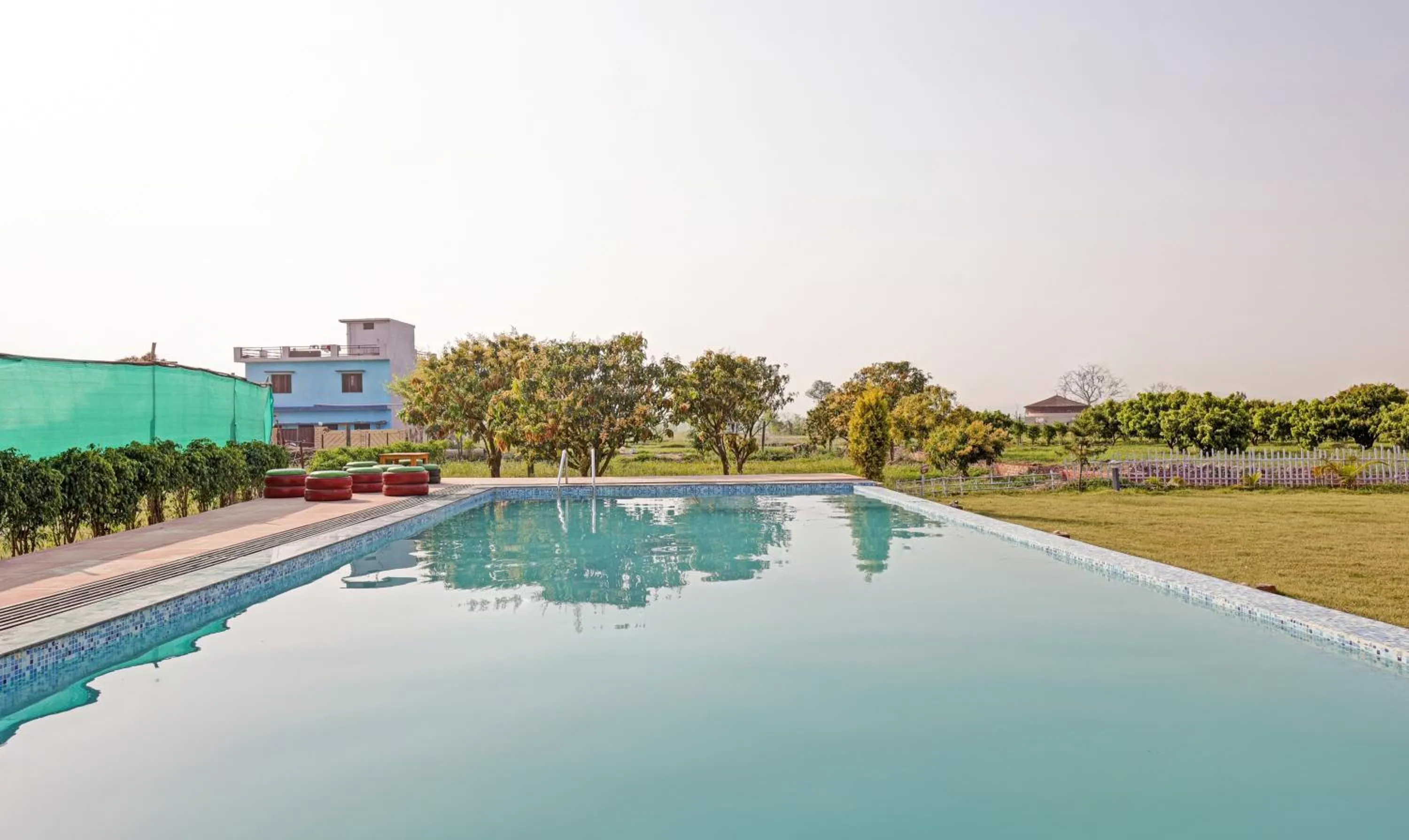 Swimming pool in Treebo Kaira Resort With Pool View, 5 Km From Jim Corbett Jungle Safari