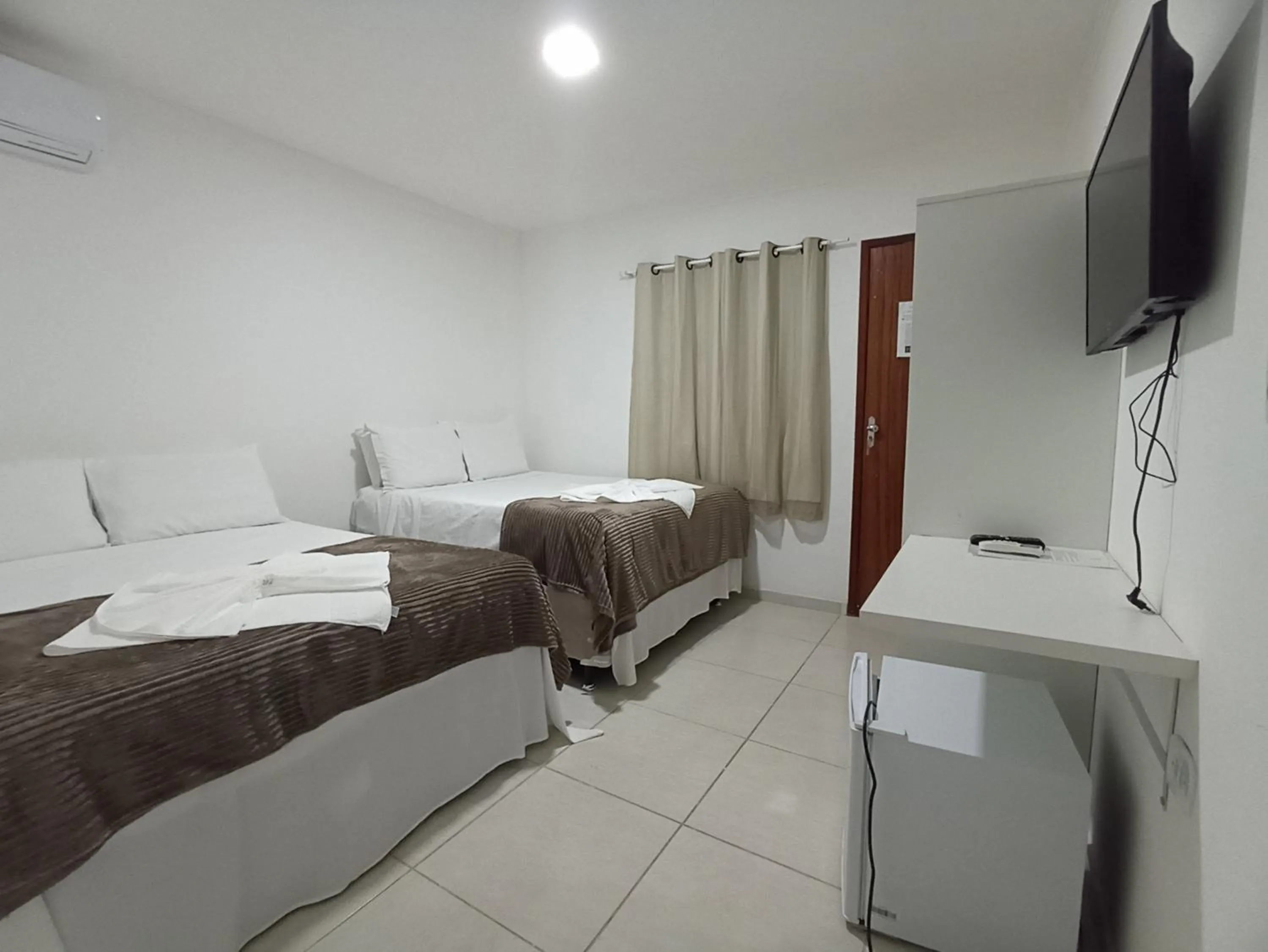 Bed in Pousada Villa Costeira