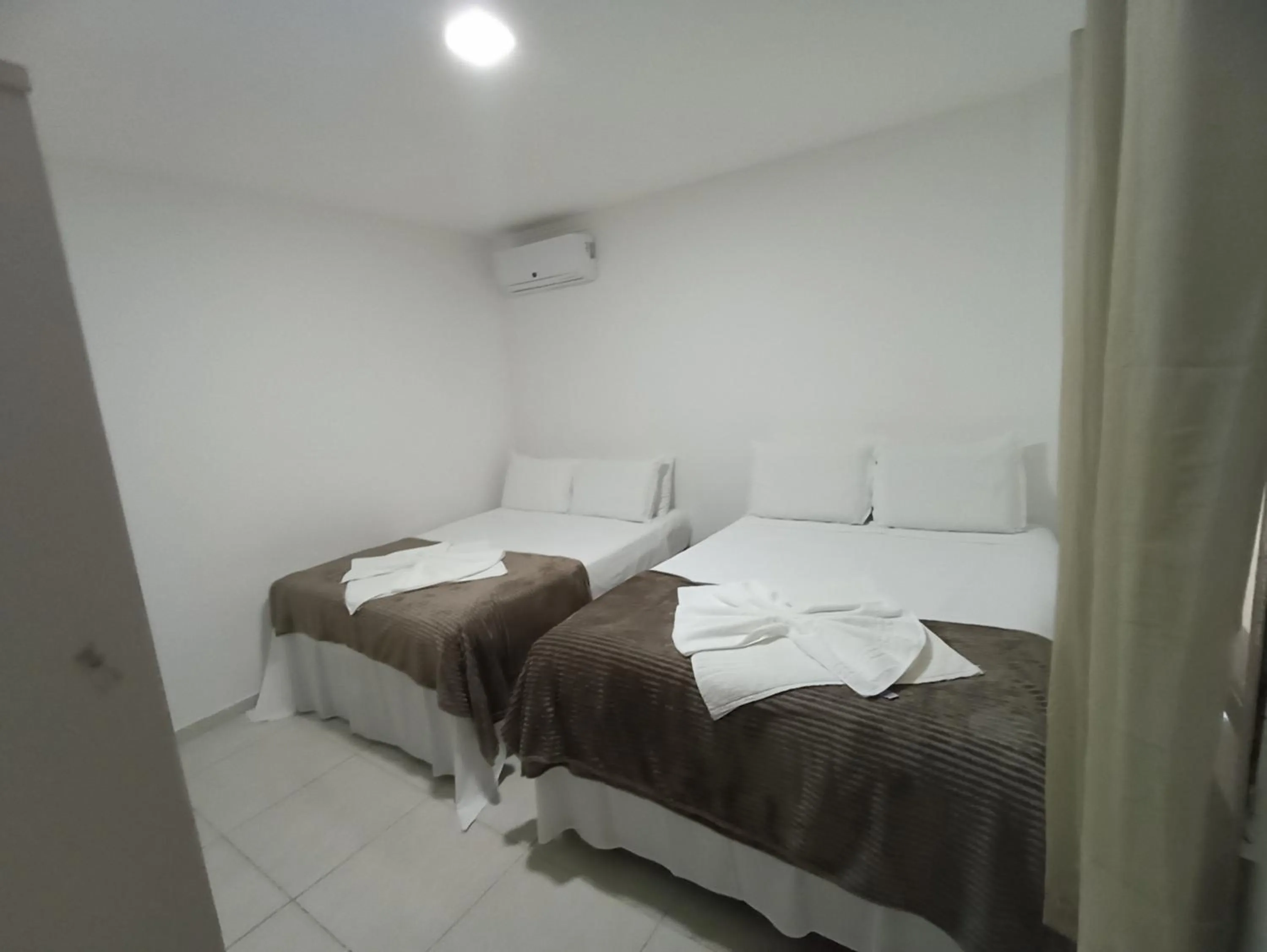 Bed in Pousada Villa Costeira