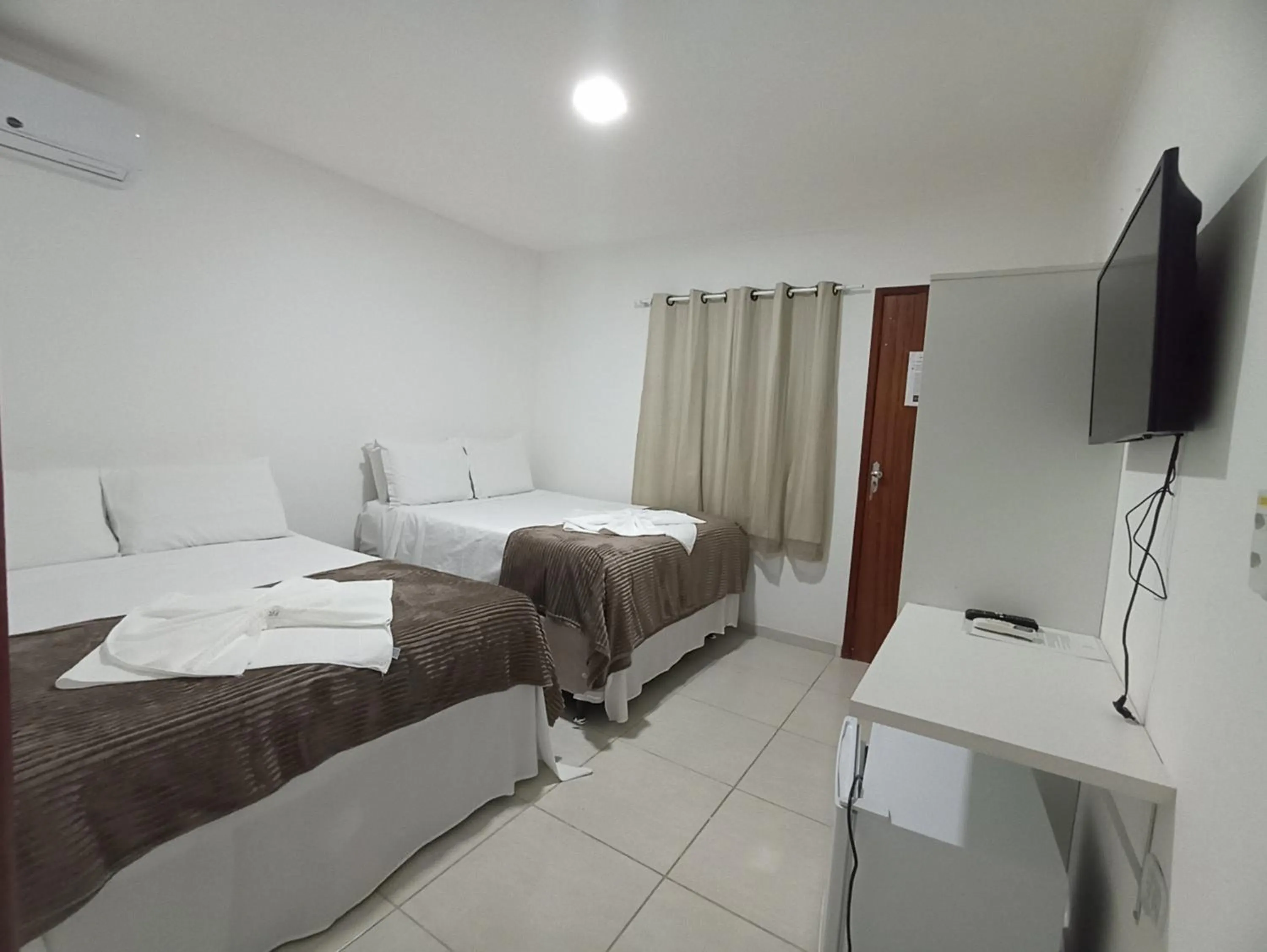 Bed in Pousada Villa Costeira