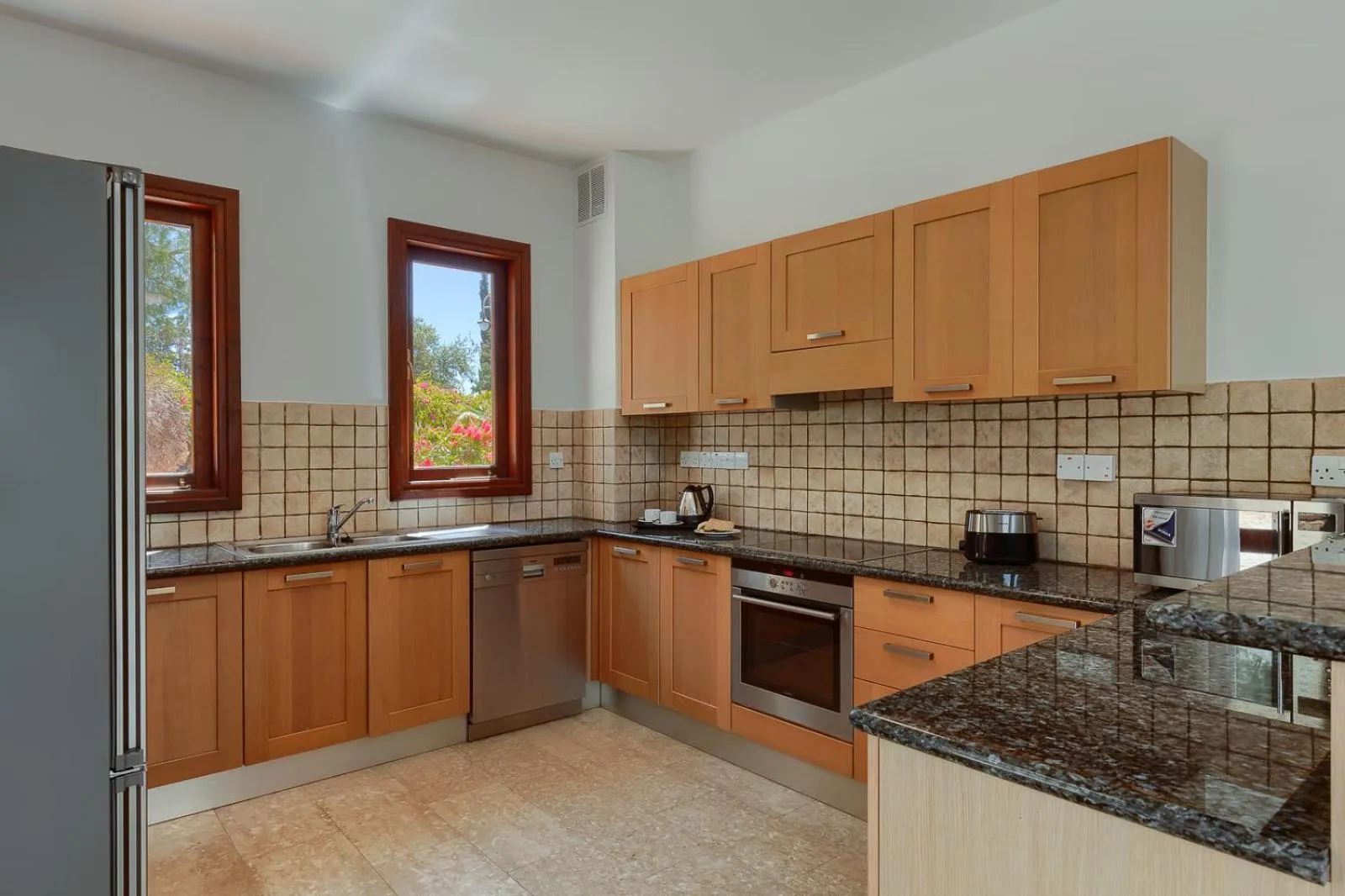 Kitchen or kitchenette in Aphrodite Hills Rentals - Superior Villas