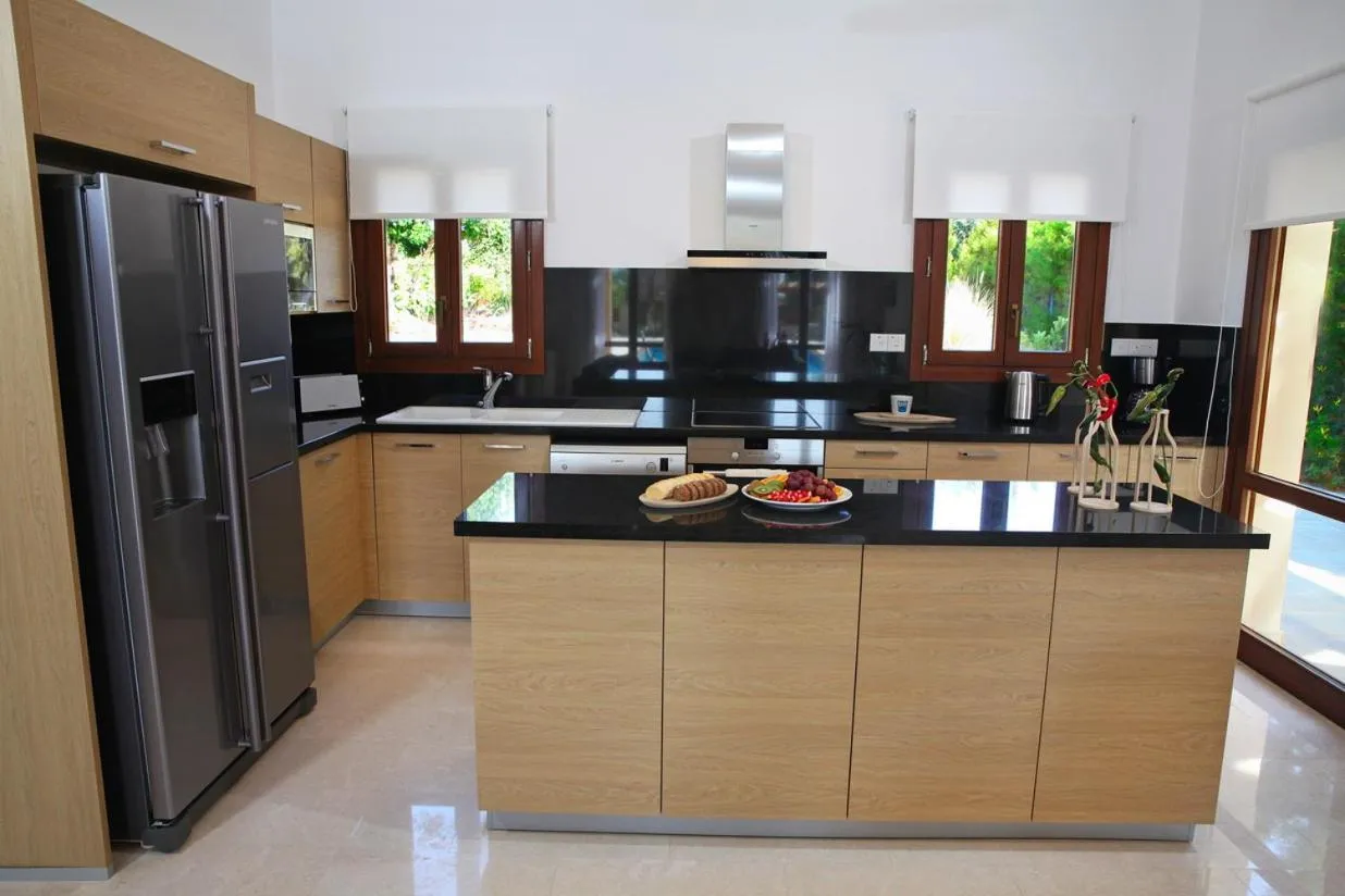 Kitchen or kitchenette in Aphrodite Hills Rentals - Superior Villas