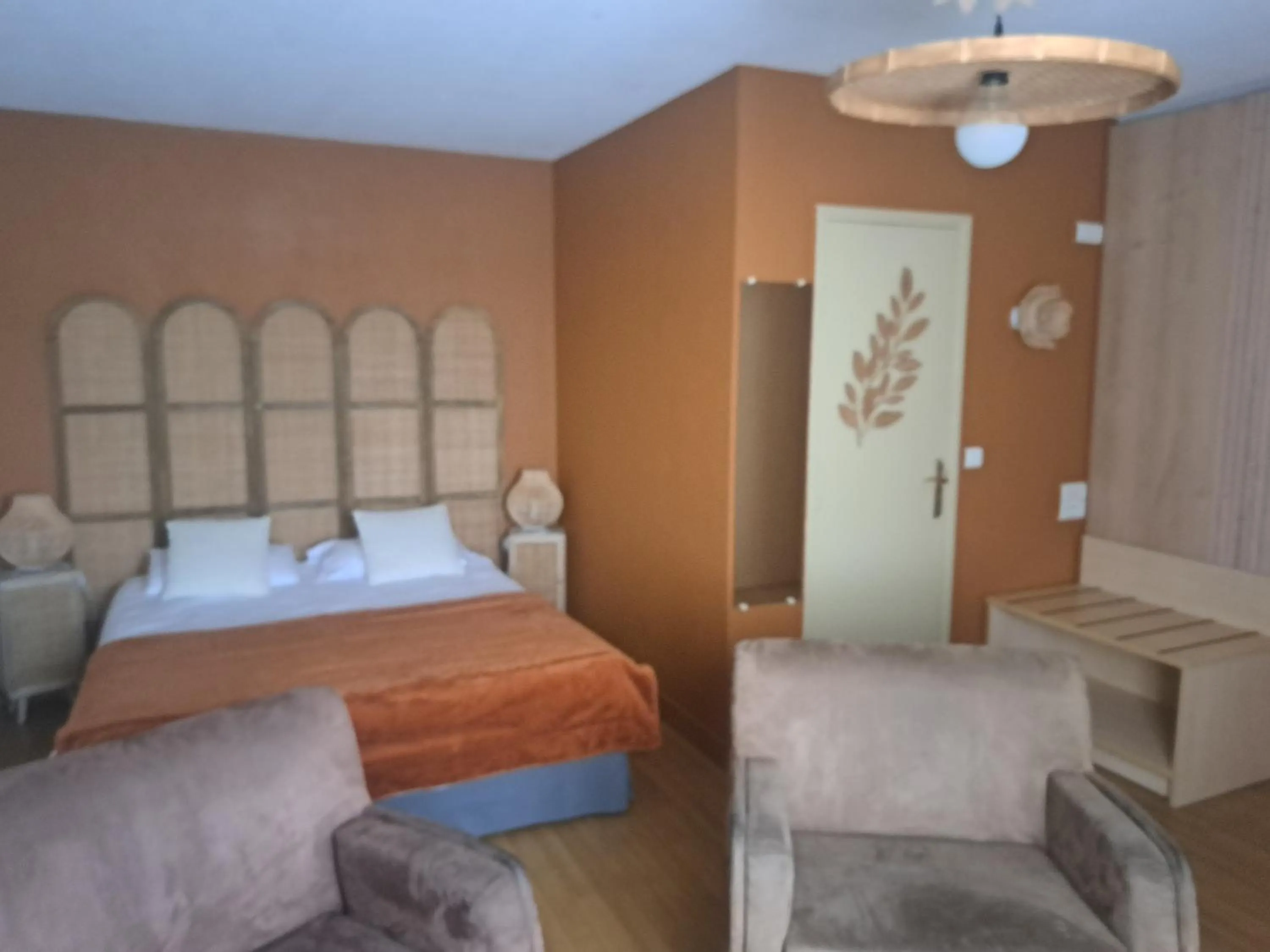 Bed in Logis Auberge De Launay