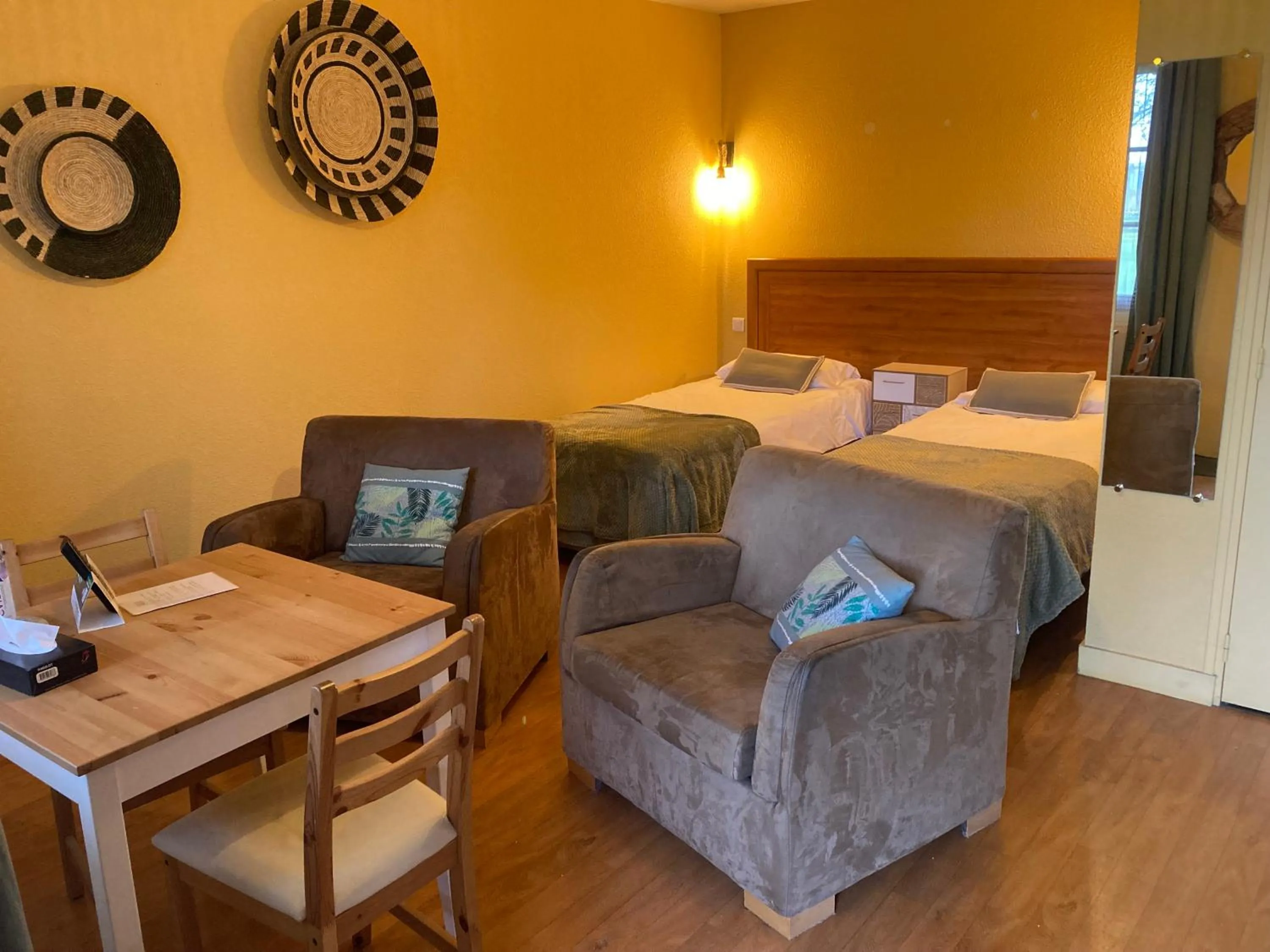 Bed in Logis Auberge De Launay