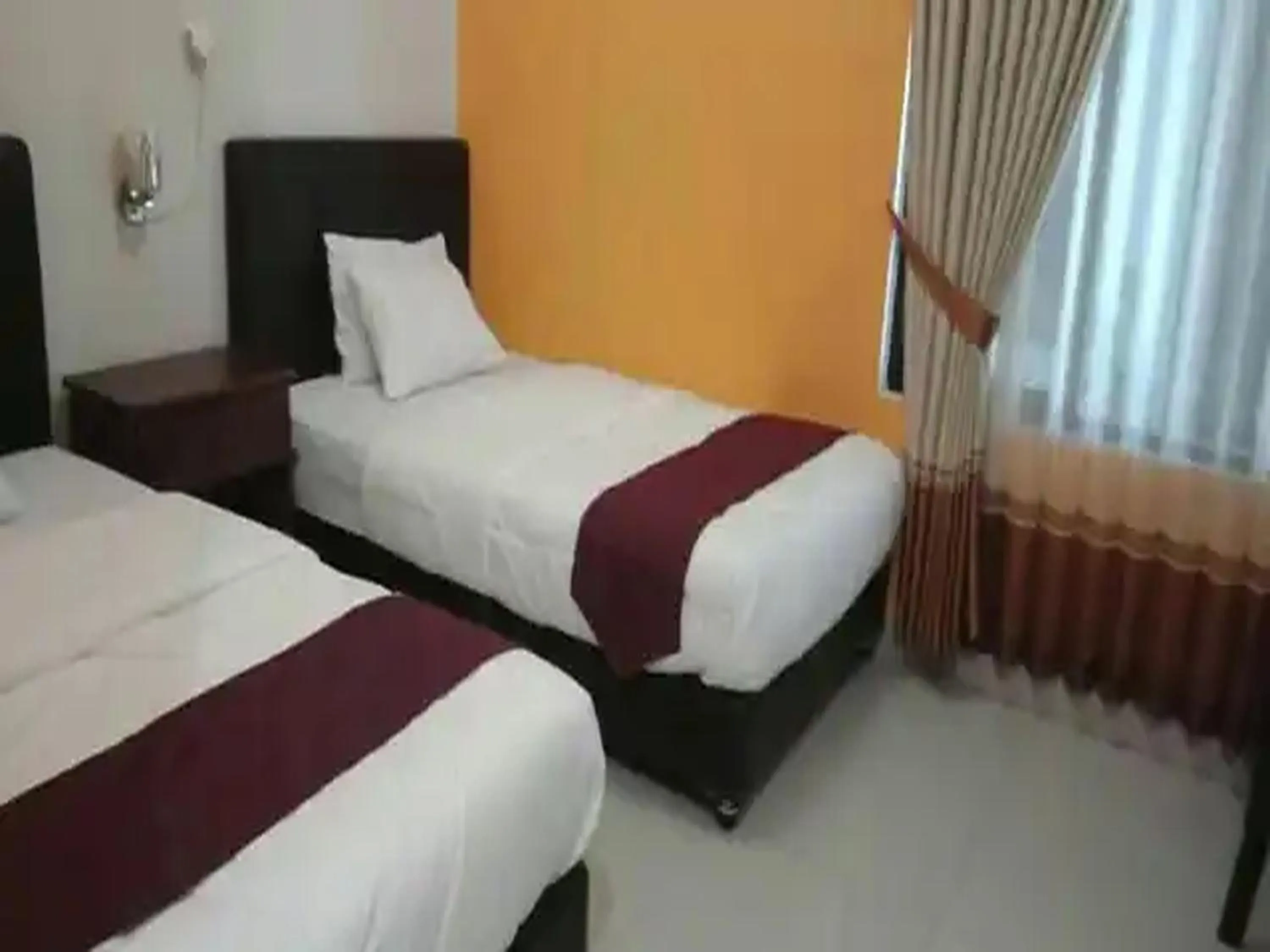 Bed in RedDoorz at Hotel Nuansa Ngawi